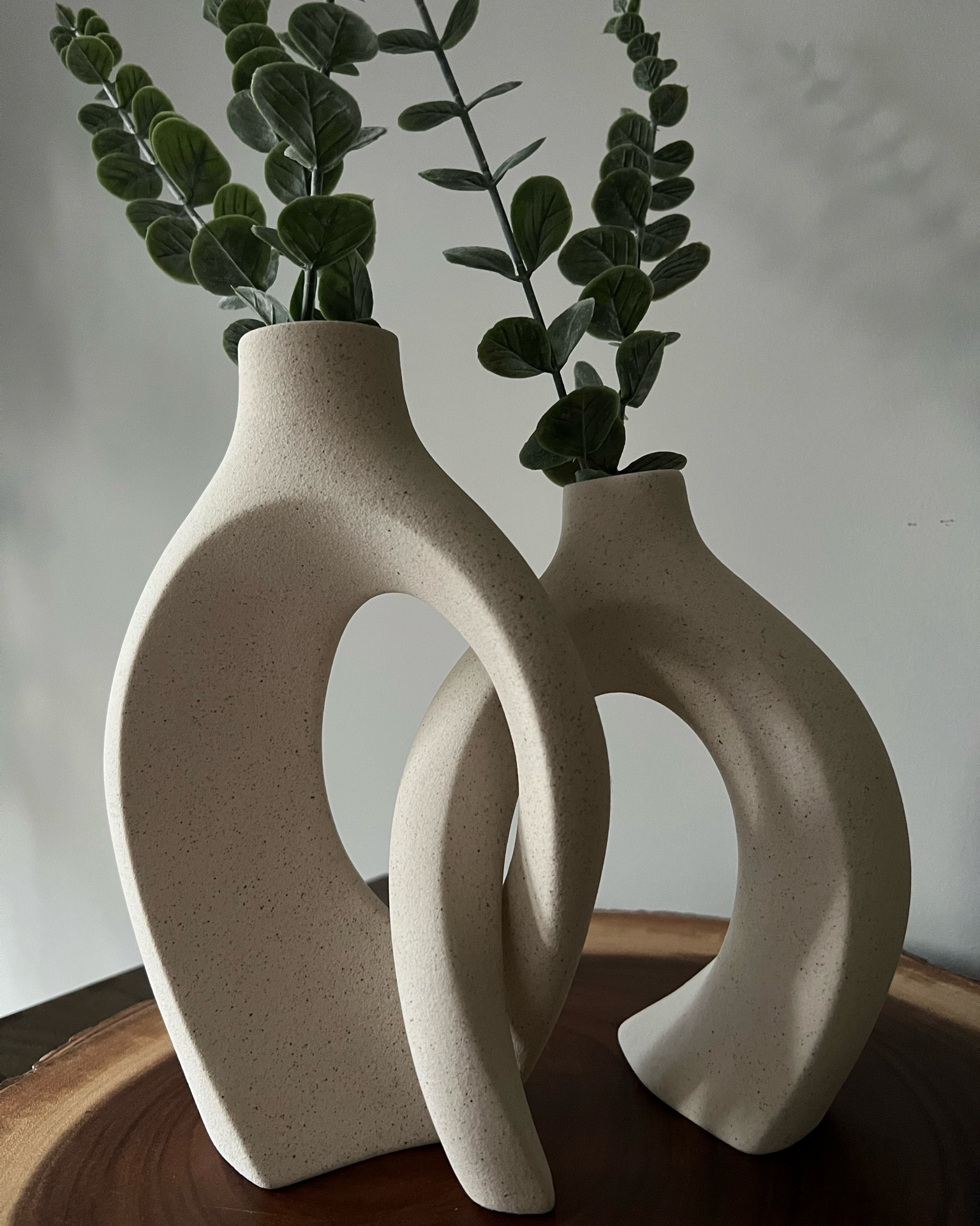 Gorgeous vases that can interlock or be displayed separately with this lovely faux eucalyptus 

#LTKhome #LTKunder50