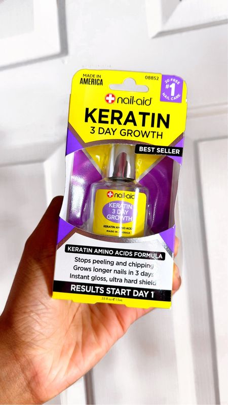 I want to take better care of my natural nails in between when I do my press on nail sets💅🏾✨. So, I picked up this keratin nail growth nail polish treatment for $4 at Walmart. 

My sister swears by it, and you’re supposed to see results within 3 days. Basically you apply two coats, and let the polish dry between each coat. It’s supposed to stop peeling and chipping, and create an ultra hard shield on your nails.

I tested it out, and the polish dries really quickly, which is great! It left my nails looking, super shiny and healthy. They definitely feel stronger too! 🙌🏾😩


#LTKbeauty #LTKfindsunder50