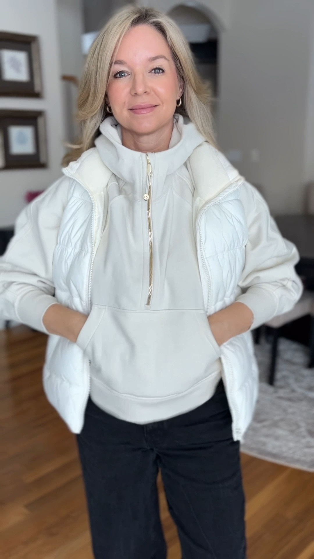 After a winter of dark neutrals, Light Ivory is the ultimate palette cleanser. It’s bright enough to feel like spring, but warm enough to bridge the gap while it’s still chilly.

Why ivory?? 

Whites can feel too stark and summery.

Beiges can sometimes feel too muddy or “safari.”

Ivory sits right in the middle—it’s warm, expensive-looking, and pairs perfectly with both winter leggings and spring denim.

The hoodie is a cotton blend fleece fabric and is super comfortable.

I think the gold zipper really dresses it up… if that’s possible for a hoodie! 😁

I’ve had this vest for a really long time and it is one of my favorite layering pieces for spring and fall. 
I’ve linked some similar and one that is the exact same color as the hoodie.

Transitional wardrobe, monochromatic styling, Scuba oversized half-zip, cream puffer vest, Quiet luxury athleisure, light ivory aesthetic, spring capsule wardrobe
