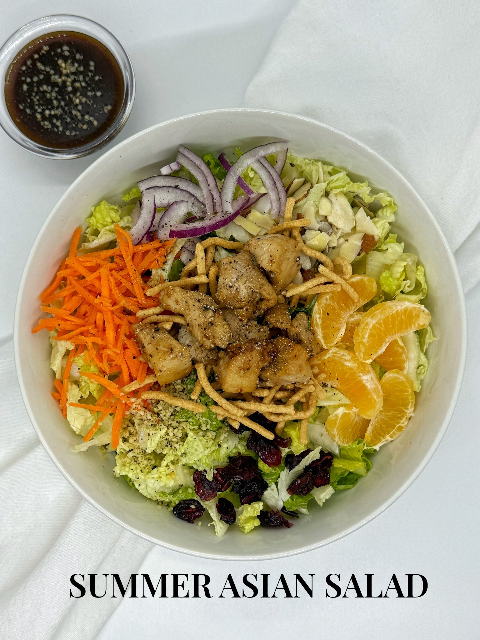 Summer Asian Salad: Romain lettuce, Napa cabbage, purple onions, sliced almonds, mandarin oranges, craisns, hemp seeds, carrots, teriyaki chicken, green onions, crispy chow mein noodles with Asian Sesame dressing

#LTKSaleAlert #LTKActive #LTKFindsUnder50
