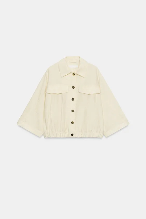 Blouse with a regular collar and elbow-length sleeves with a tab and button. Featuring front flap... | Zara NL