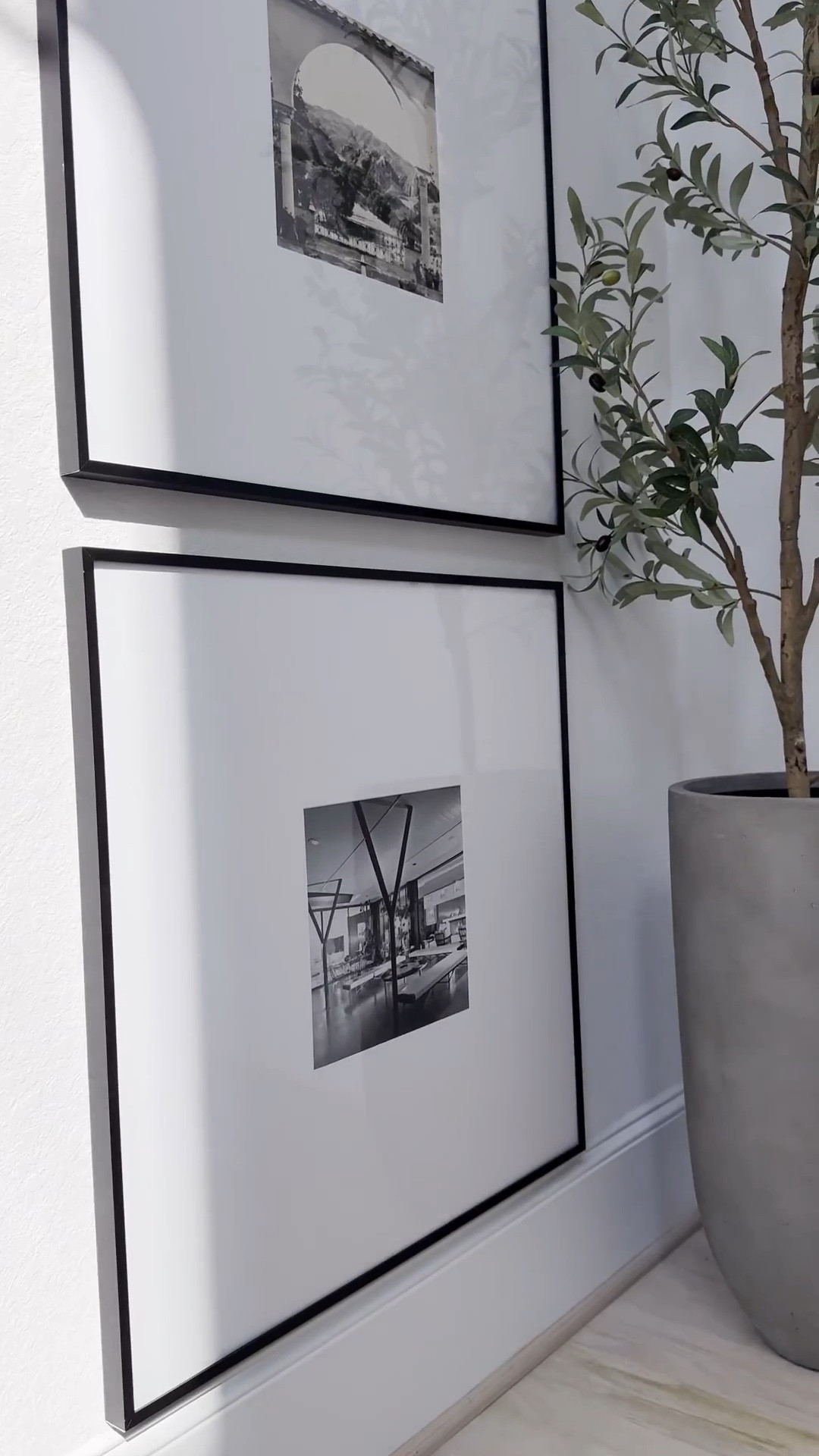 Many of you have LOVED & inquired about these frames and here are the specific measurements - since the frames come in various sizing options:  

Measurements:
Frames are by @Frameiteasy
Art Size: 10" x 10"
Outside Frame Size: 27 3/16" x 27 3/16"
Style: Ashford, in Satin Black
Matting: 8 1/2" Smooth White (White Core)
Cover: Clear Acrylic
Backing: Acid Free Foamcore
Spacing Between Frames: 3 Inches 

I added pictures from the Architecture Digest book. Black and white prints add a classic finish especially with these black frames. 
