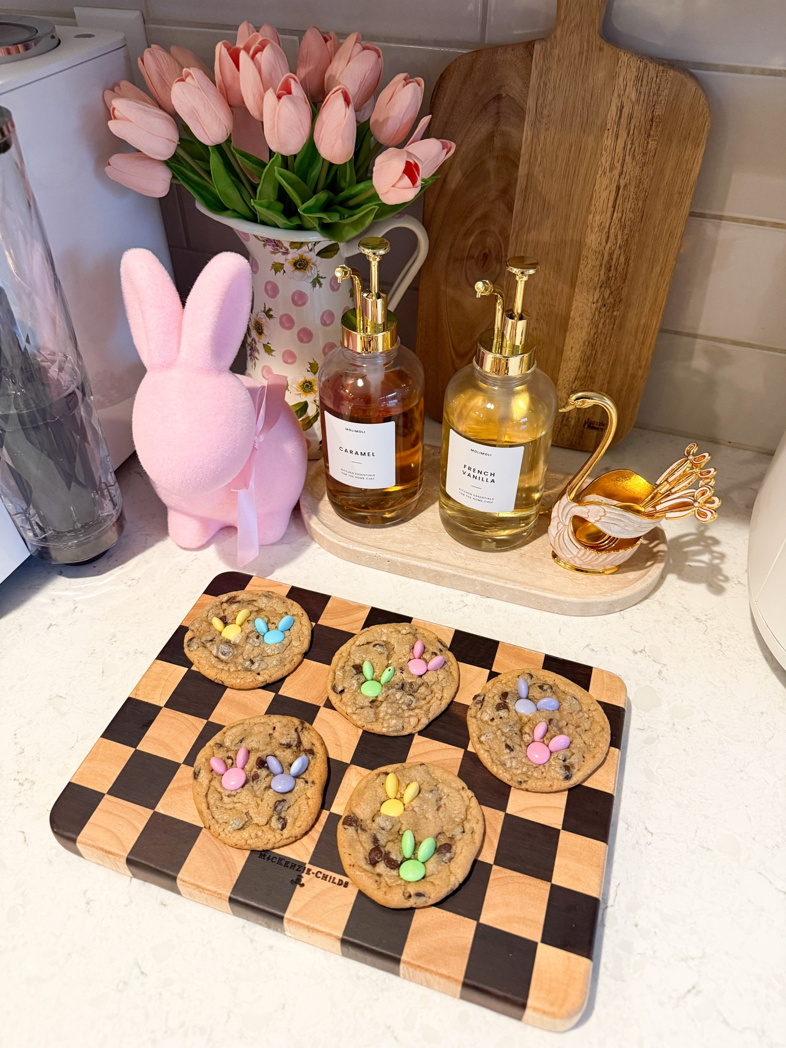 EASY EASTER COOKIES! 🐰 Bake pre-made chocolate chip cookie dough, and add the pastel M&Ms after the cookies cooled off a bit. So cute and fun for Easter!

Pillsbury Ready To Bake Cookie Dough, Chocolate Chip, M&M'S Easter Milk Chocolate Candies, parchment paper, bunny, baking sheet, spoon set, tray, tulips, Mackenzie childs pitcher and check chop board, Syrup Dispenser for Coffee Bars

#LTKHome #LTKSeasonal #LTKKids