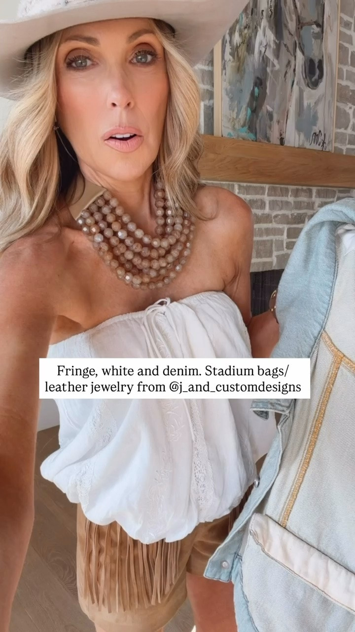 This Anthropologie bubble top is one of my favorite pieces right now. It’s perfect styled with boots and a hat for a country concert look, and my upcycled stadium bag has been such a great all around accessory.

#LTKSeasonal #LTKOver40 #LTKmomlife
