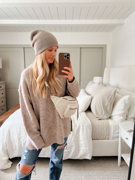 Get 25% off the beanie and bag with code KATIESAVE25 ! Jeans are on sale when you copy the PROMO CODE below and paste at checkout. 

Sweater: XS (very oversized!)
Jeans: Medium Destroy in 26 (need a 25)
Slippers: size up one! I have an 8


#LTKSale #LTKSeasonal