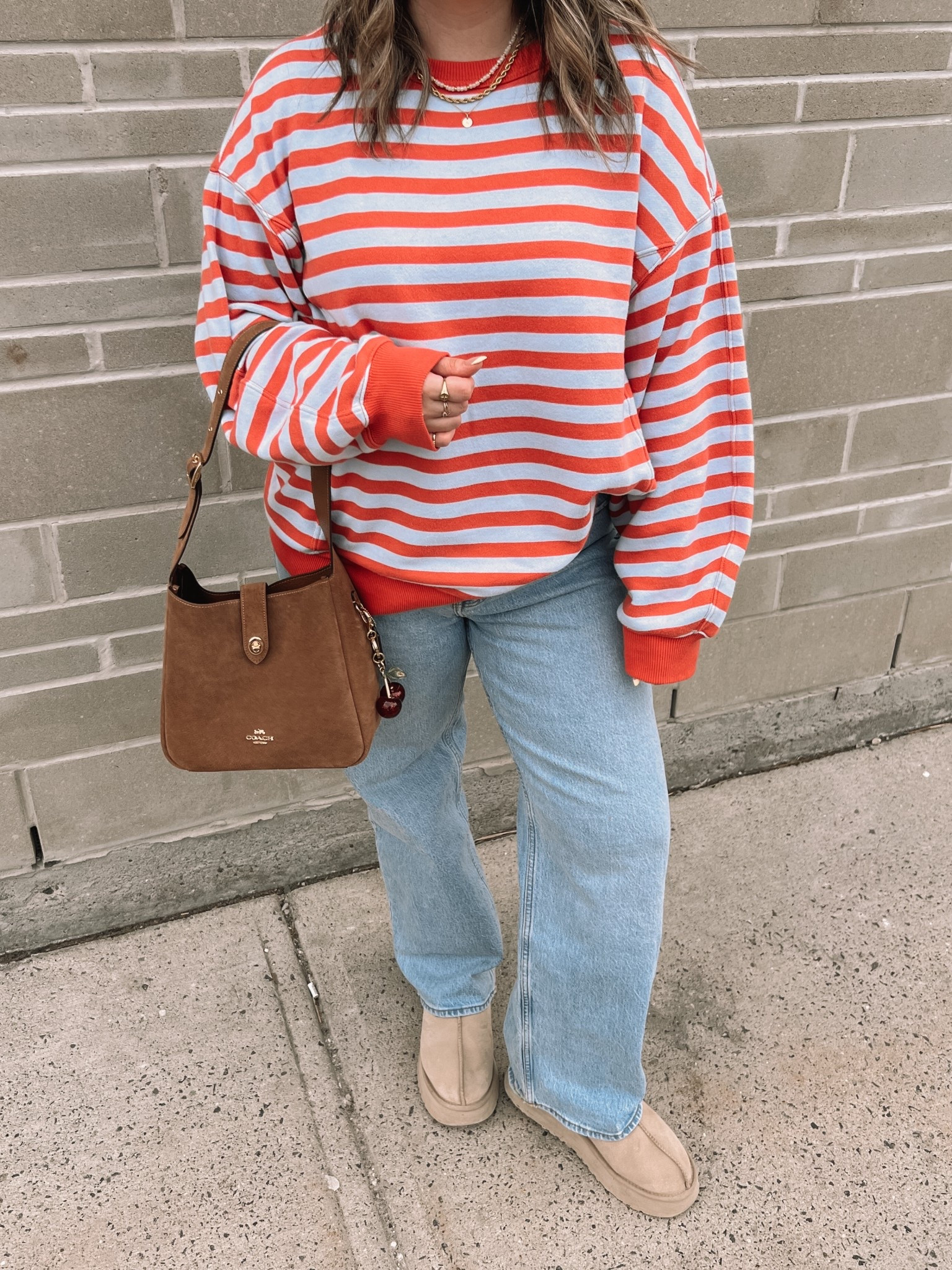 Simple & fun spring outfit! Striped sweatshirt is so cozy and I love the peach & baby blue color combo! Runs big, sized down to M. Wearing my usual 32 in the jeans. I’m a 9.5-10 shoe and wear a 10 in the Ugg tazz platforms


#LTKjeans #LTKsale #LTKmidsize
