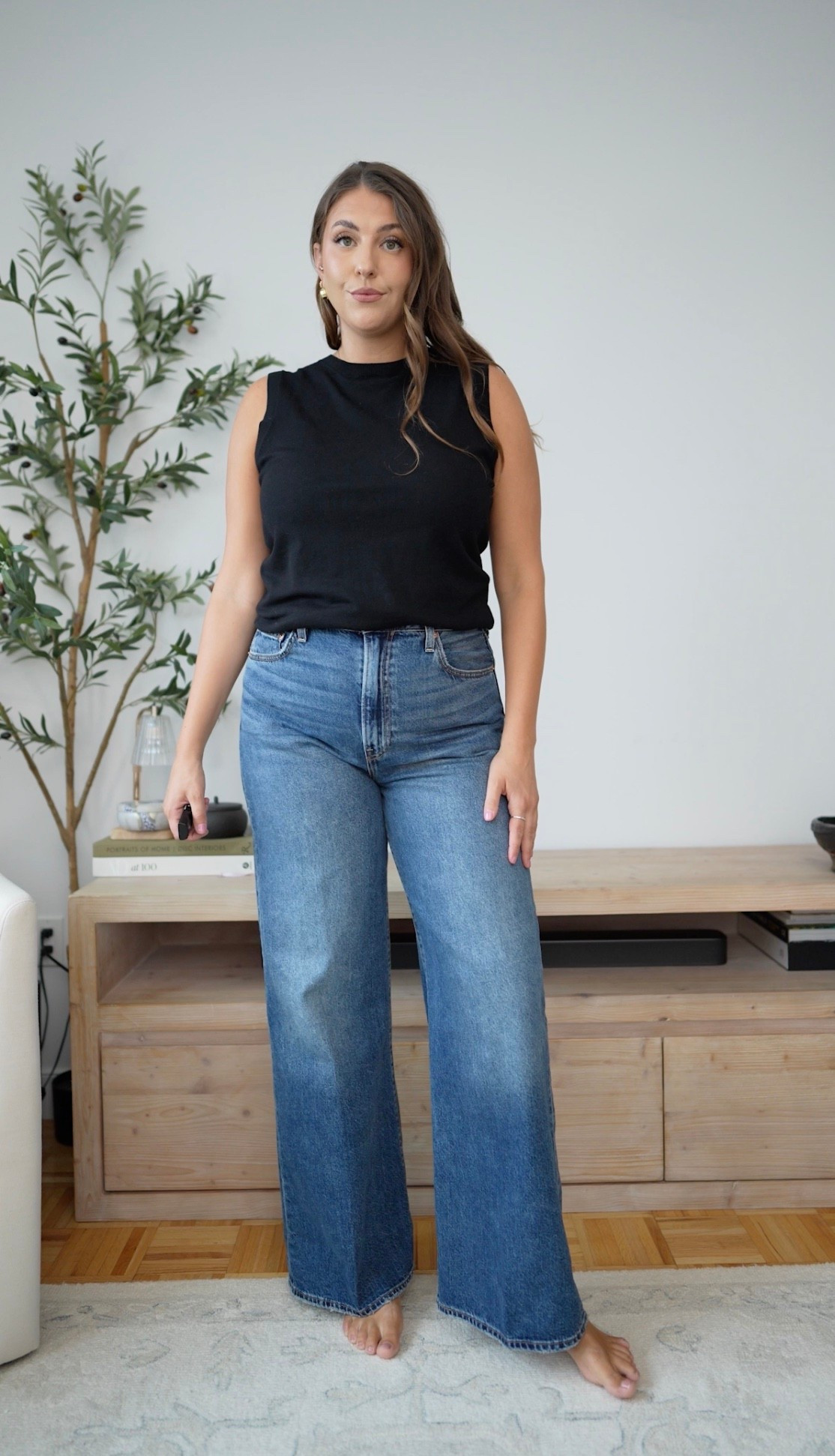 The perfect jeans-and-a-top formula 🖤 A simple black sleeveless knit paired with wide leg denim feels effortless, flattering and so easy to transition into fall. Add a belt, loafers or flats to dress it up.

Amazon fashion, wide leg jeans, fall outfit, casual chic, denim outfit, black top, everyday style, fall basics, transitional style, elevated casual

#LTKMidsize #LTKootd #LTKgrwm