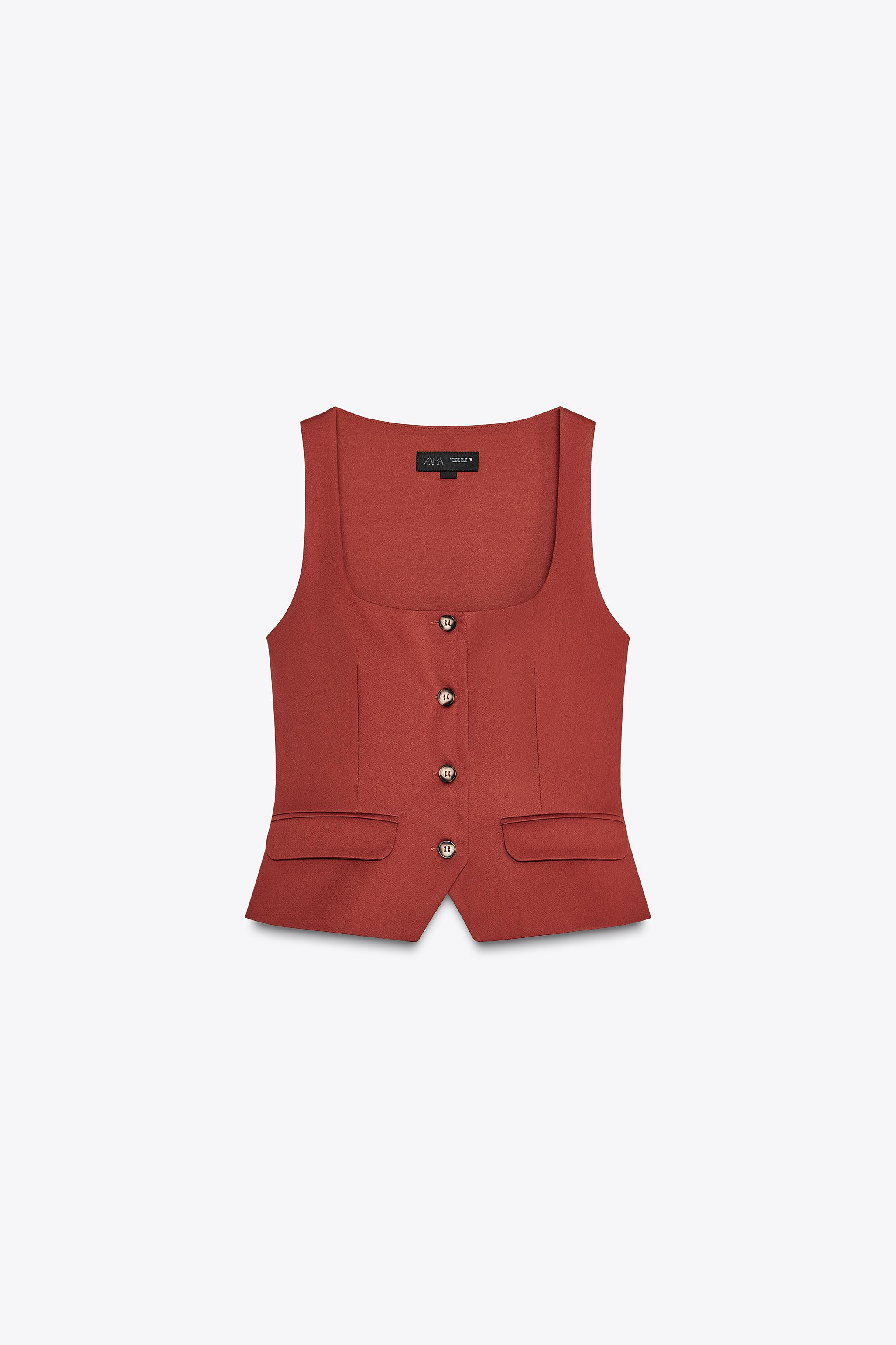 Square neck sleeveless top. Front flap mock pockets. Matching lining. Front button closure. | Zara US