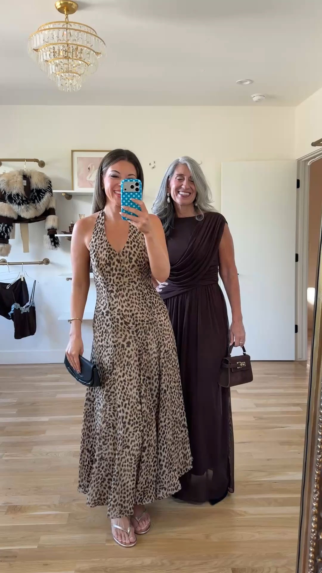 Emerson's leopard print is a fall wedding favorite, with a halter V-neck that keeps the top simple and a flowing skirt that twirls without clinging.

Claudia's chocolate brown gown drapes over one shoulder to cover the upper arm, then gathers into a ruched waist that smooths the midsection. The chiffon skirt falls light and straight over the hips.

Save this and share it with a friend who's shopping. 💌

Claudia | 5'4½" | 135 | medium or 6
Emerson | 5'4" | 130 | small or 2

Wedding Guest Dress | Fashion over 50 | Mother of the Bride | Mother of the Groom | Black Tie | Formal Gown | Winter Wedding | Fall Wedding | Tummy Flattering Dresses | Special Occasion