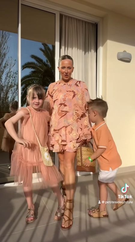 Outfit of the night in Ibiza 

Coral flowy dress, Ted Baker
Coral girls dress, Next 
Gold Sandals girls, Next 
Orange boys top, TU
Boys white shorts Next 
Boys sandals, Matalan 
Basket bag, Ted baker 
Flower earrings, Phase Eight
Gold earrings, Monica Vinader 

#LTKtravel #LTKfamily #LTKeurope