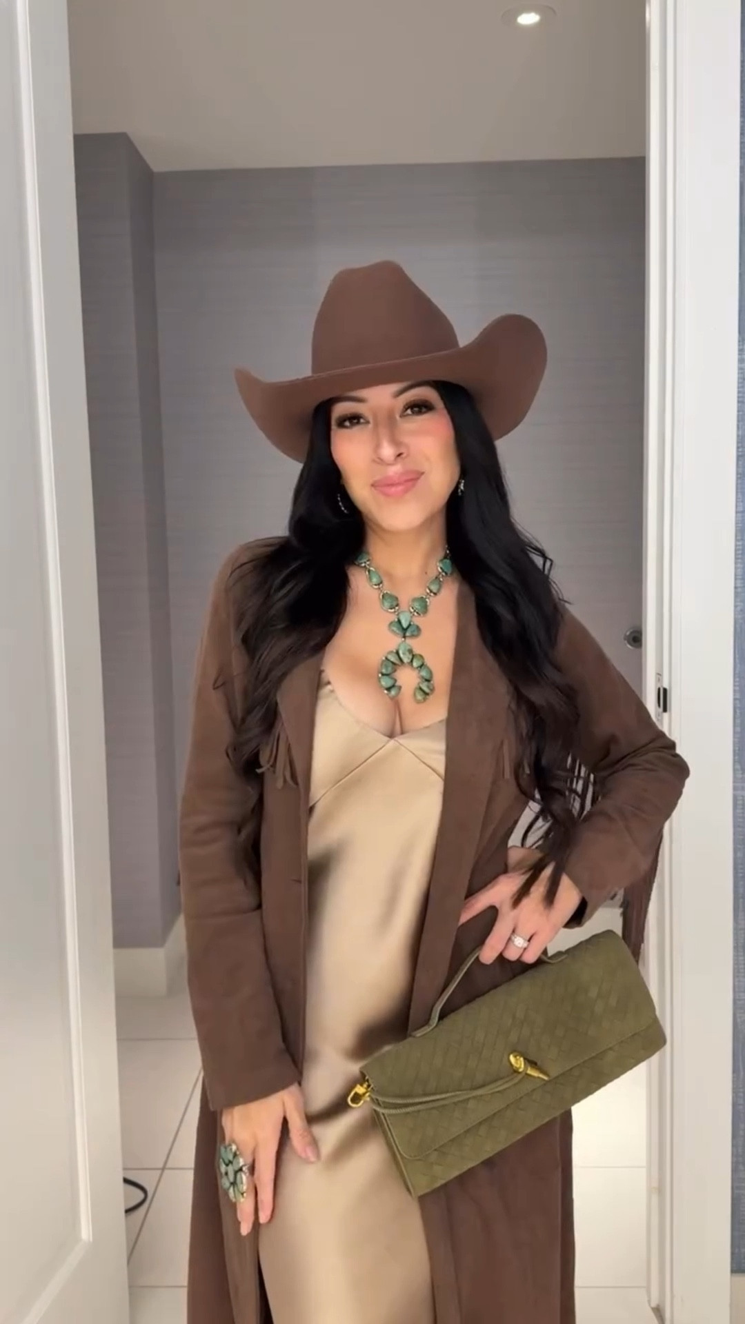 NFR DAY 7 — NIGHT LOOK 🪖
Wearing this stunning dress from @shopemrymae the fabric, the fit, the layering potential… everything.
Stacked it with fringe, turquoise, and a pop of green because it is Military Night, after all. 🤪 Simple, bold, and so easy to style.

#LVWFW #westernlifeandstyle #nfr2025 #nfr #nfrfashion  #nfrstyle #westernfashion #westernstyle #cowgirlchic #cowgirlstyle #rodeostyle #vegas #westernoutfits