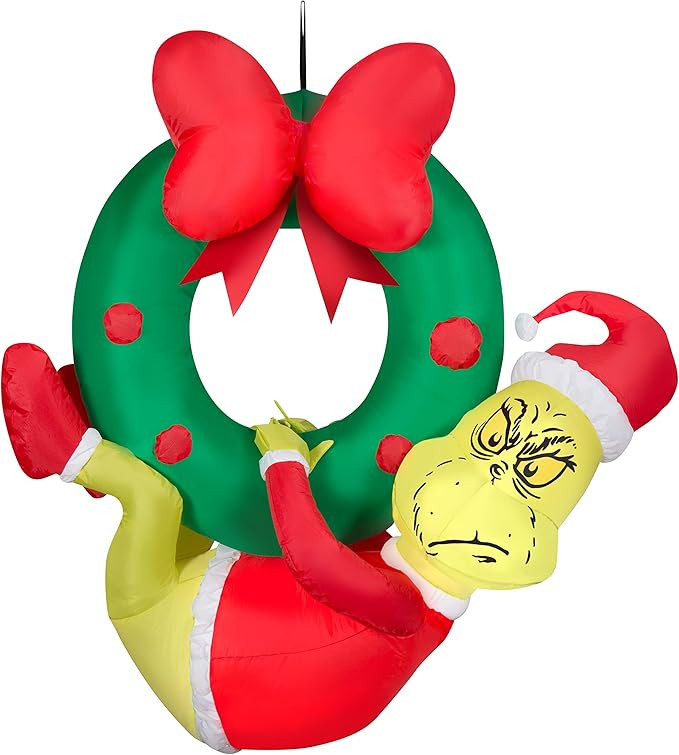 Gemmy Christmas Airblown Inflatable Grinch Hanging from Wreath Dr. Seuss, 4 ft Tall, Green | Amazon (US)