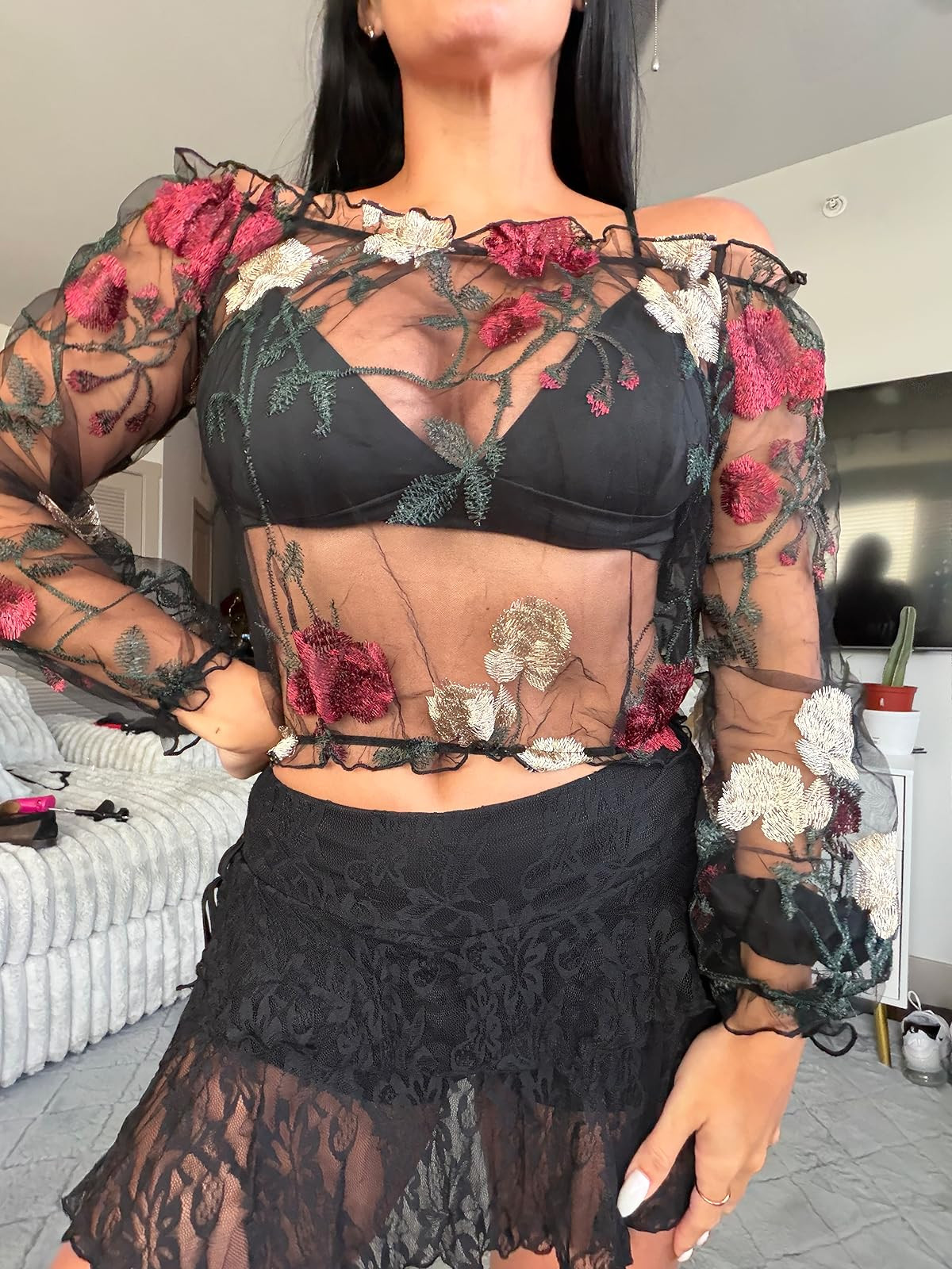 Make a romantic statement in this sheer floral embroidered mesh top paired with a flirty black lace tiered mini skirt. This intricate, high-contrast look is perfect for a date night or a special evening out! #FloralMesh #LaceSkirt #DateNightStyle 

 #LTKdayinmylife #LTKootd #LTKSaleAlert