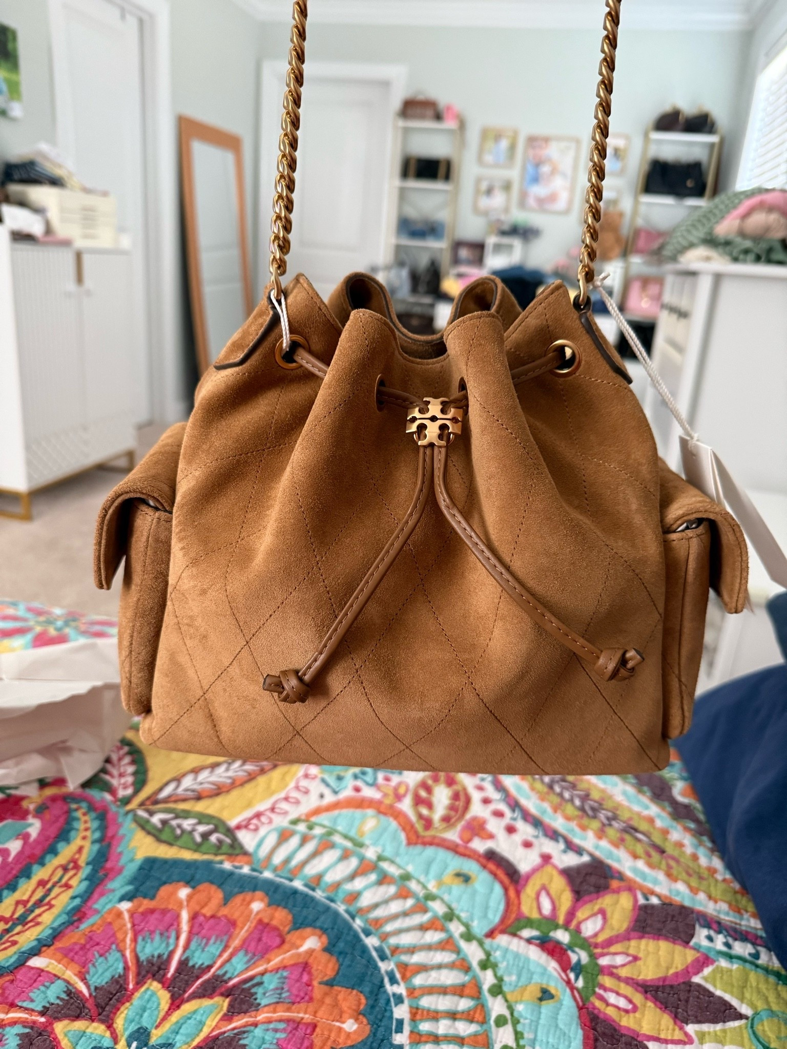 Tory Burch Charlie drawstring bag in suede! Currently in stock! Hurry and go grab her before she sells out 🏃‍♀️

#LTKselfcare #LTKmomlife #LTKdayinmylife