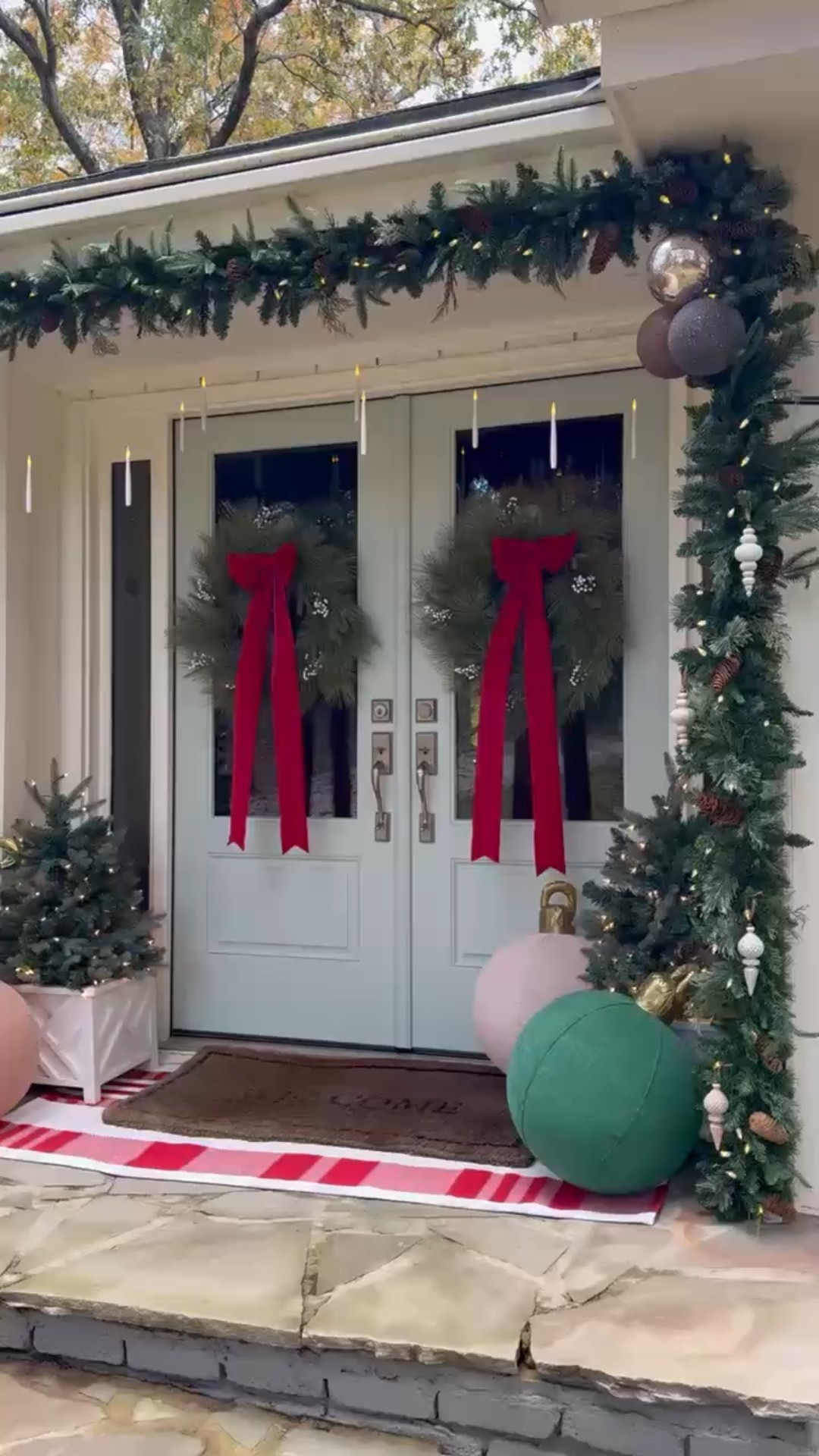 Classic Holiday Welcome 🎄✨

A warm holiday welcome featuring pre-lit garlands, faux greenery wreaths with red velvet bows, and light-up mini trees — all finished with oversized ornaments and a festive striped rug. The perfect way to greet the season in style!

#holidaydecor #christmasporch #holidayhome #classicchristmas #frontporchdecor #christmasinspo #eanesinteriors



#LTKHome #LTKSeasonal #LTKHoliday