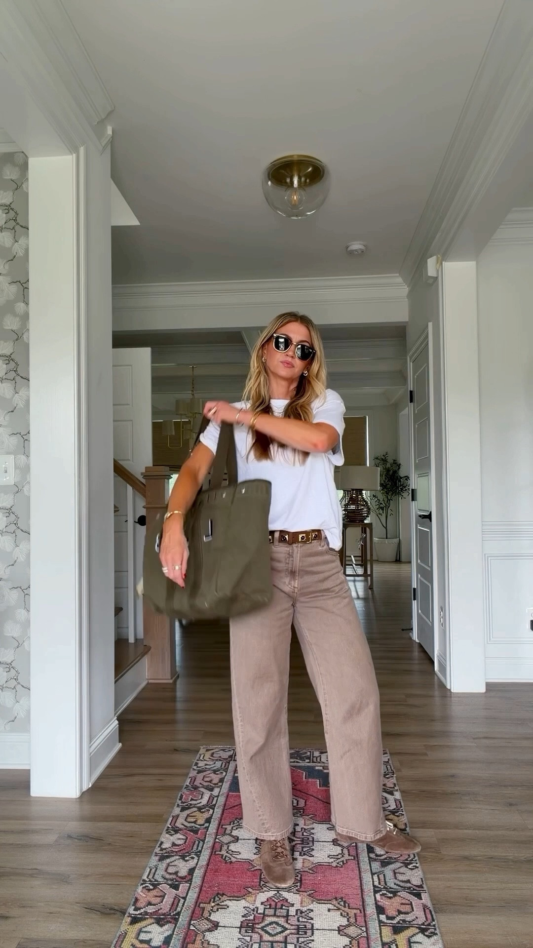 Love these brown jeans for fall. 
 White slub knit tee: runs oversized, wearing a S 
Brown barrel denim: ON SALE at Nordstrom, runs TTS, wearing a 25. 
Brown suede sneakers: so comfortable! Runs TTS 

Alex mill tote, layered jewelry, casual outfit, mom outfit

#LTKootd #LTKgrwm #LTKdayinmylife
