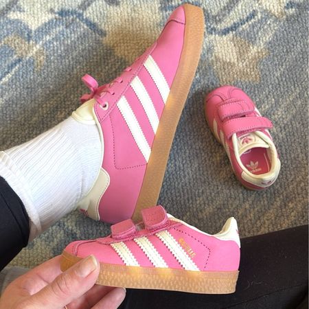 Mommy & me shoes 🙊 these are selling FAST so act asap! The womens have been sold out for ages, but these are the “girls” which fit women’s sizing and are way cheaper!!! I wear a womens 9 and get a 7 in the girls gazelles. So, size down 2 sizes from your regular womens shoe size! 
- adidas gazelle - pink gazelles - pink sneakers - women’s sneakers - toddler sneakers - baby sneakers - pink baby shoes 

#LTKshoecrush #LTKbaby #LTKkids