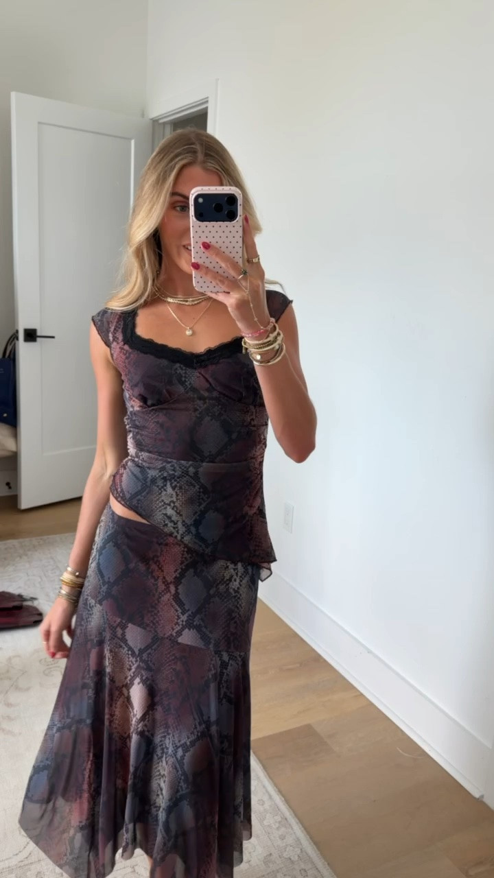 Walmart size xs. Serve sleek, statement energy in Madden NYC's Asymmetrical Lace Top. Designed in sheer, printed mesh with a double-layer bodice for coverage, the asymmetrical silhouette skims your curves for a flirty fit and charms with delicate lace trim on the sweetheart neckline. Ready for nights out, rooftop plans or whatever the vibe calls for. Edgy or feminine—there are so many ways to style Madden NYC's Asymmetrical Midi Skirt. Crafted in layers of lightweight mesh, one printed, one solid, this skirt enchants with an asymmetrical hip seam and uneven hanky hem. Heading out for the night? Slip it on with a tee and moto jacket or get date-night ready with a cute cardi and leather boots, either way, this skirt is sure to rock your wardrobe.

#LTKootd #LTKSeasonal #LTKdayinmylife