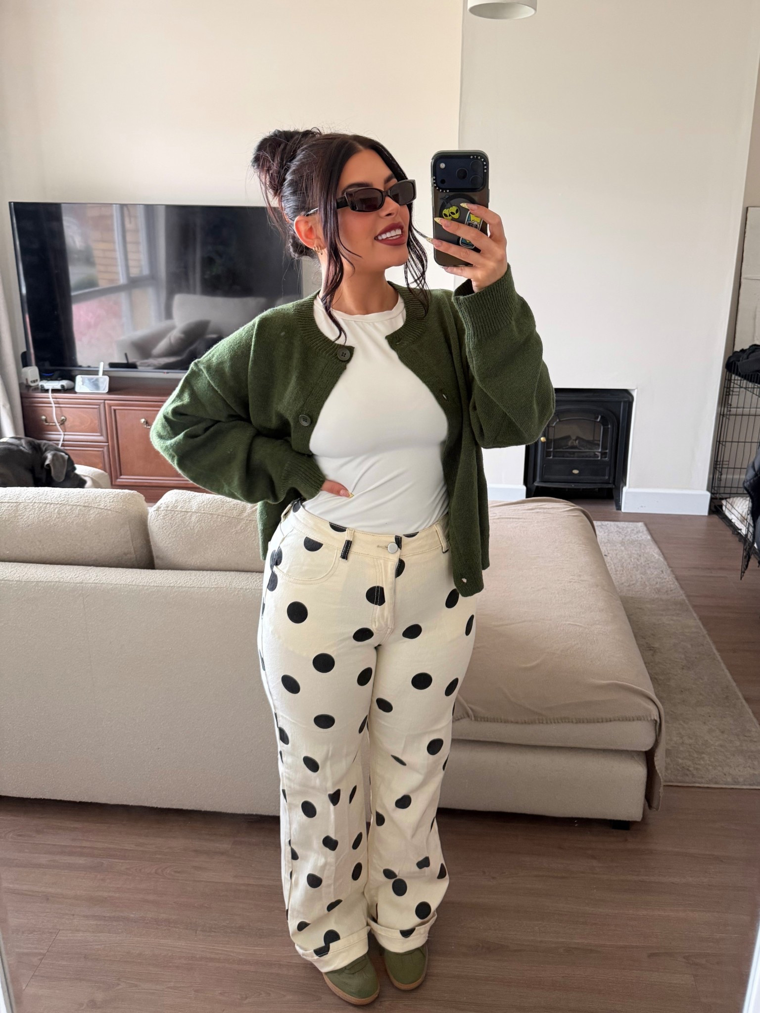 Green + polka dots might be my new favorite combo 🤍✨  
An easy everyday outfit that still feels put together — cozy cardigan, classic white tee, and the cutest polka dot jeans. Added some small sunnies for a little extra vibe.  

Everything is linked here on my LTK! 🫶 #LTKStyle #LTKFinds #EverydayOutfit #CasualStyle #polkadots #ootd #outfitinspo 

#LTKpetite #LTKspring #LTKstyletip