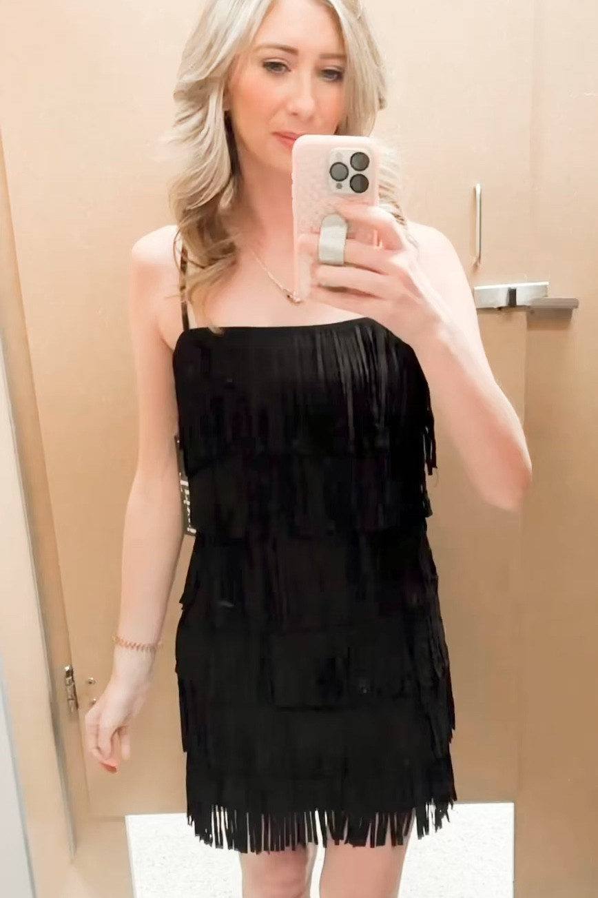 I’m coming to y’all from the dressing room (so excuse their dirty mirror!) because my house is under construction, but I couldn’t wait to share this fun tiered fringe dress that I snagged for my trip to Nashville!! Also perfect for a concert!!! I tagged lots of similar dresses below!! 

#LTKstyletip #LTKfindsunder100 #LTKFestival