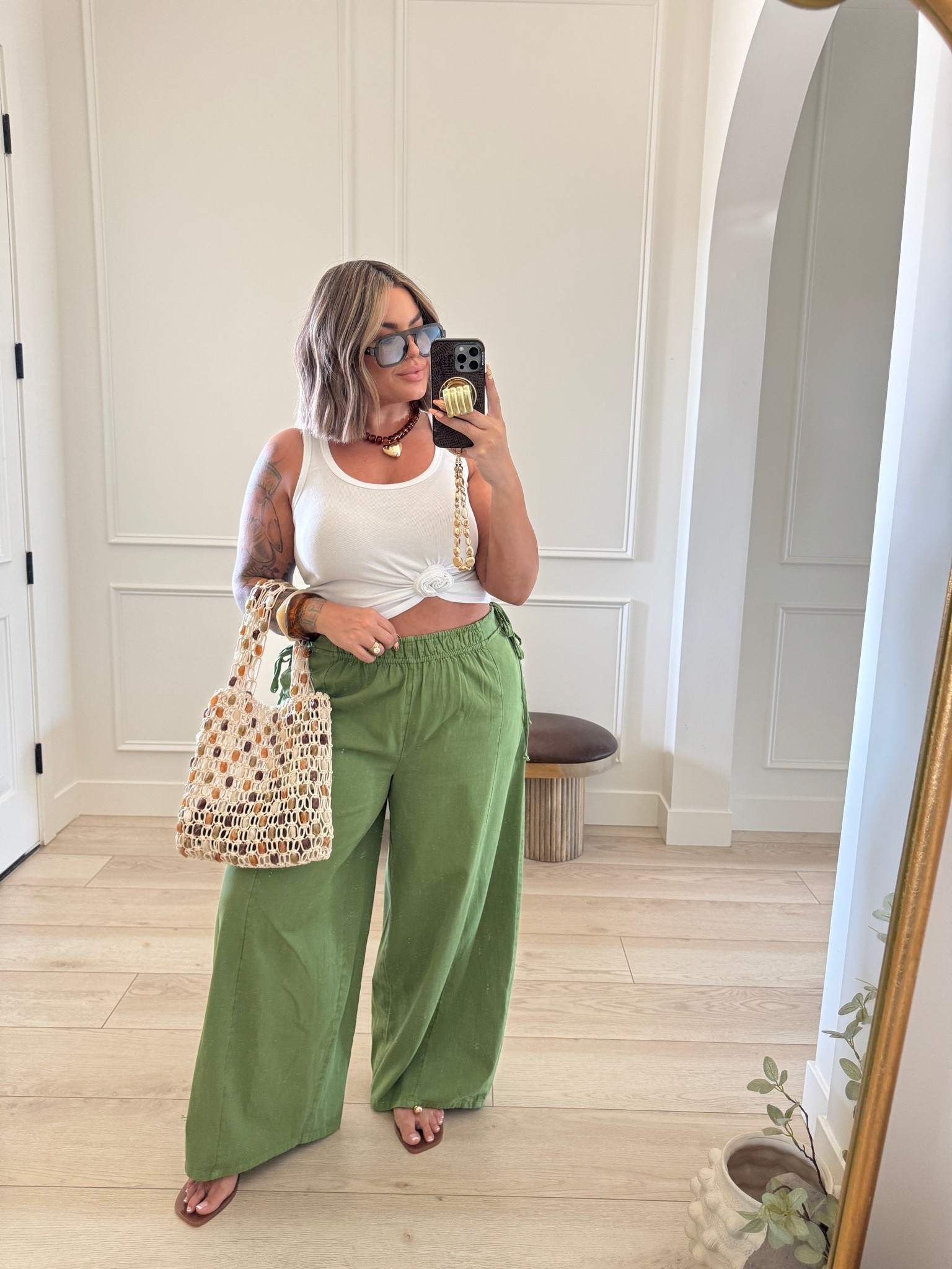 Top m 
Pants L I have them in pink and green they are both so cute.  
Sandals size up.