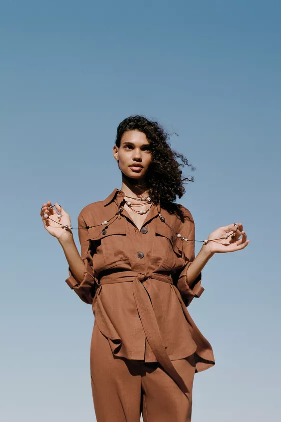 Cord necklace with beads of different shapes, colors and sizes. | Zara US