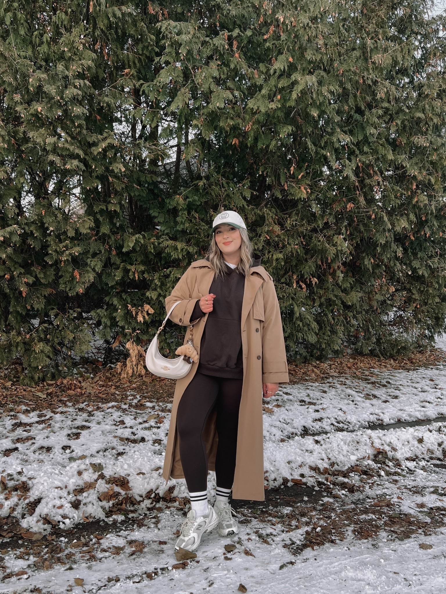 Casual winter outfit! Wearing my usual size L in the leggings. Sized down to M in the hoodie, it runs big! Both are in the color “deep earth”. Linked this year’s version of my trench coat, wearing my usual L. Sneakers are so comfy for walking, but run a little big. I’m a 9.5-10 shoe and wear a 9 in these


#LTKwinter #LTKstyletip #LTKmidsize