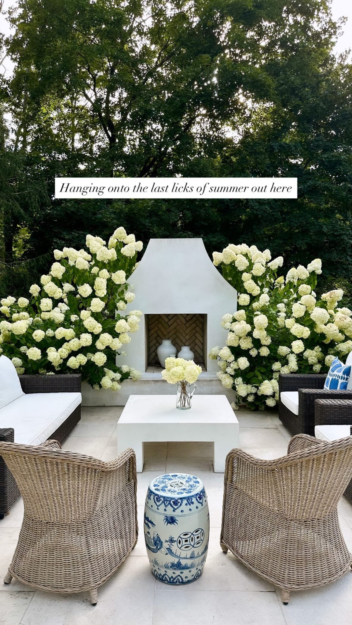 Outdoor patio, outdoor furniture, Connecticut home, fireplace, coffee table, wicker chairs. 

#LTKParties #LTKHome #LTKFamily