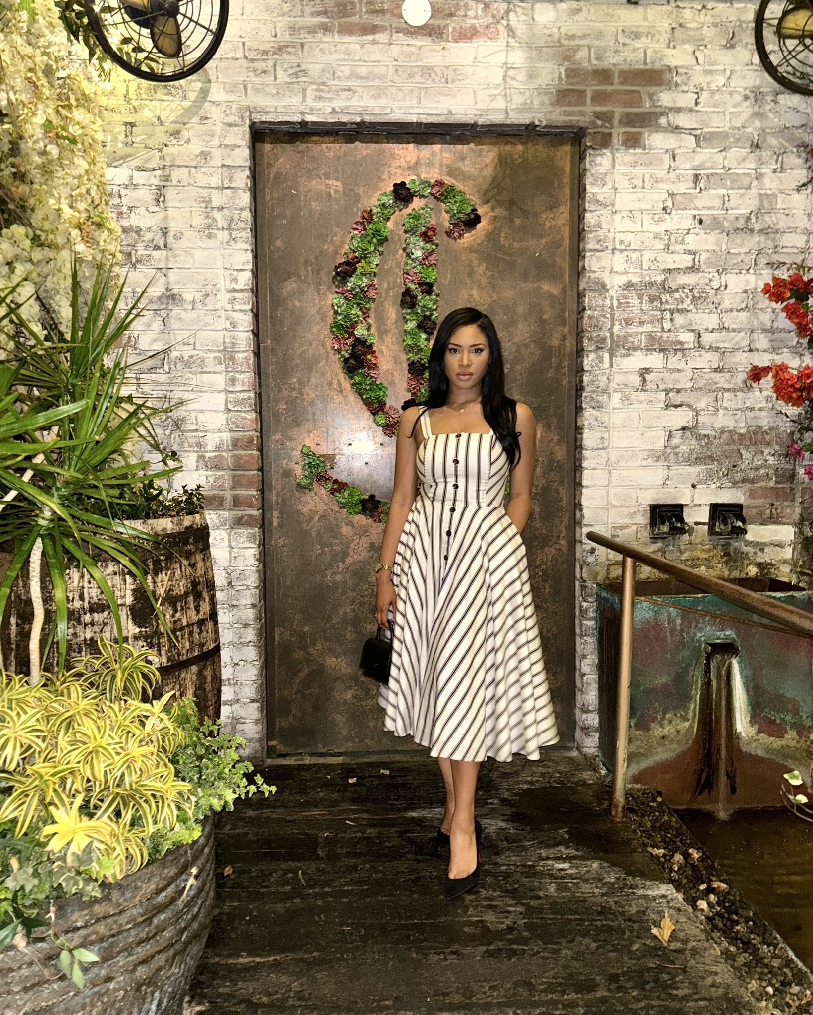 Effortless elegance in stripes 🤍🖤
This striped midi dress is giving timeless sophistication with a modern twist. I love how the fitted bodice and flowy A-line skirt flatter the figure while still keeping it breezy and comfortable. Perfect for a chic dinner, vacation nights, or brunch with the girls. I paired it with classic black pumps and a mini black handbag for that polished, pulled-together look.

📌 Style tip: Add a soft wave to your hair and a neutral glam beat for an effortlessly elevated vibe.

#LTKShoeCrush #LTKParties #LTKStyleTip