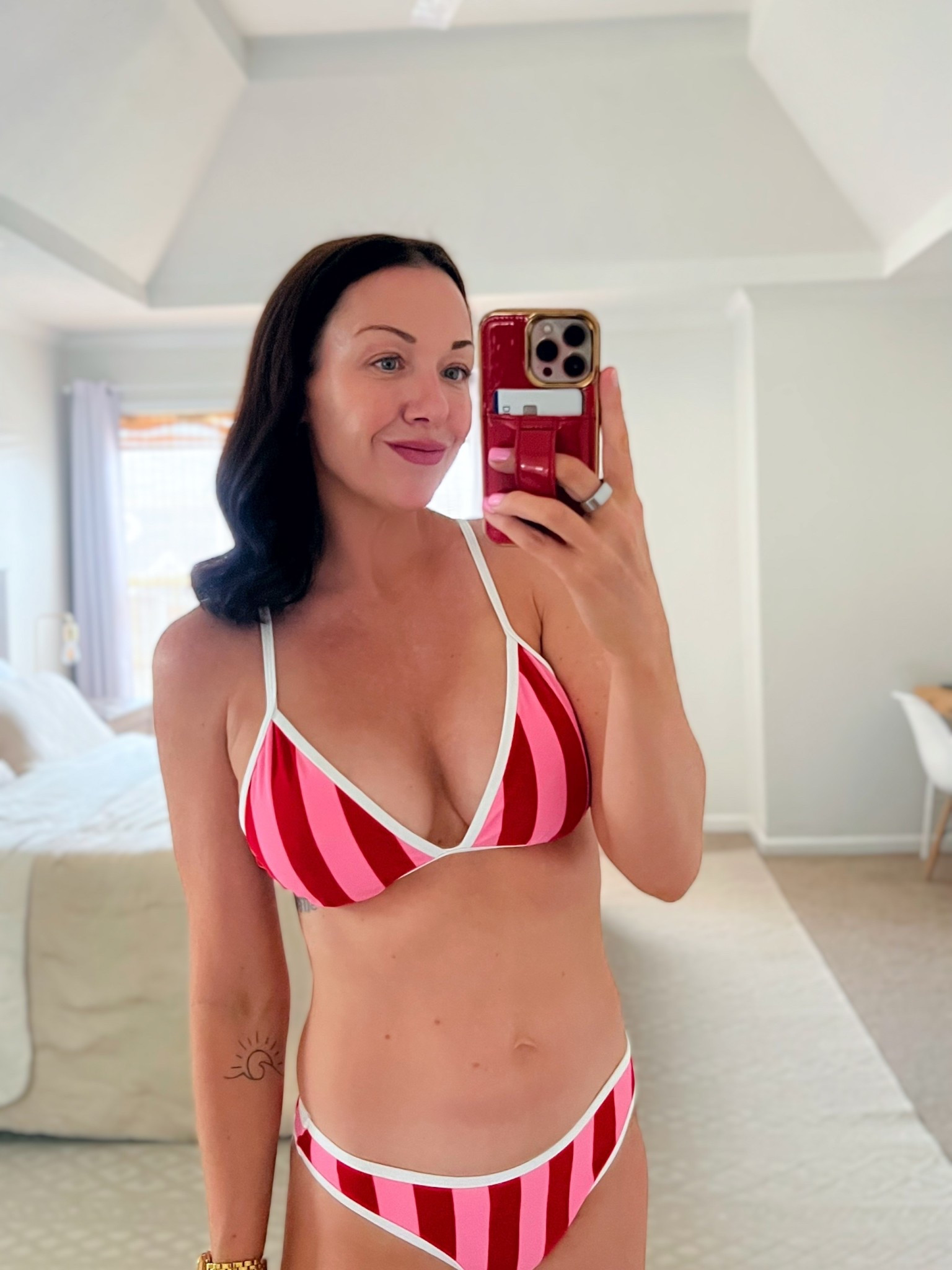 A pink and red striped bikini, YES PLEASE TARGET ❤️🩷

#LTKOver40 #LTKgrwm #LTKSwim