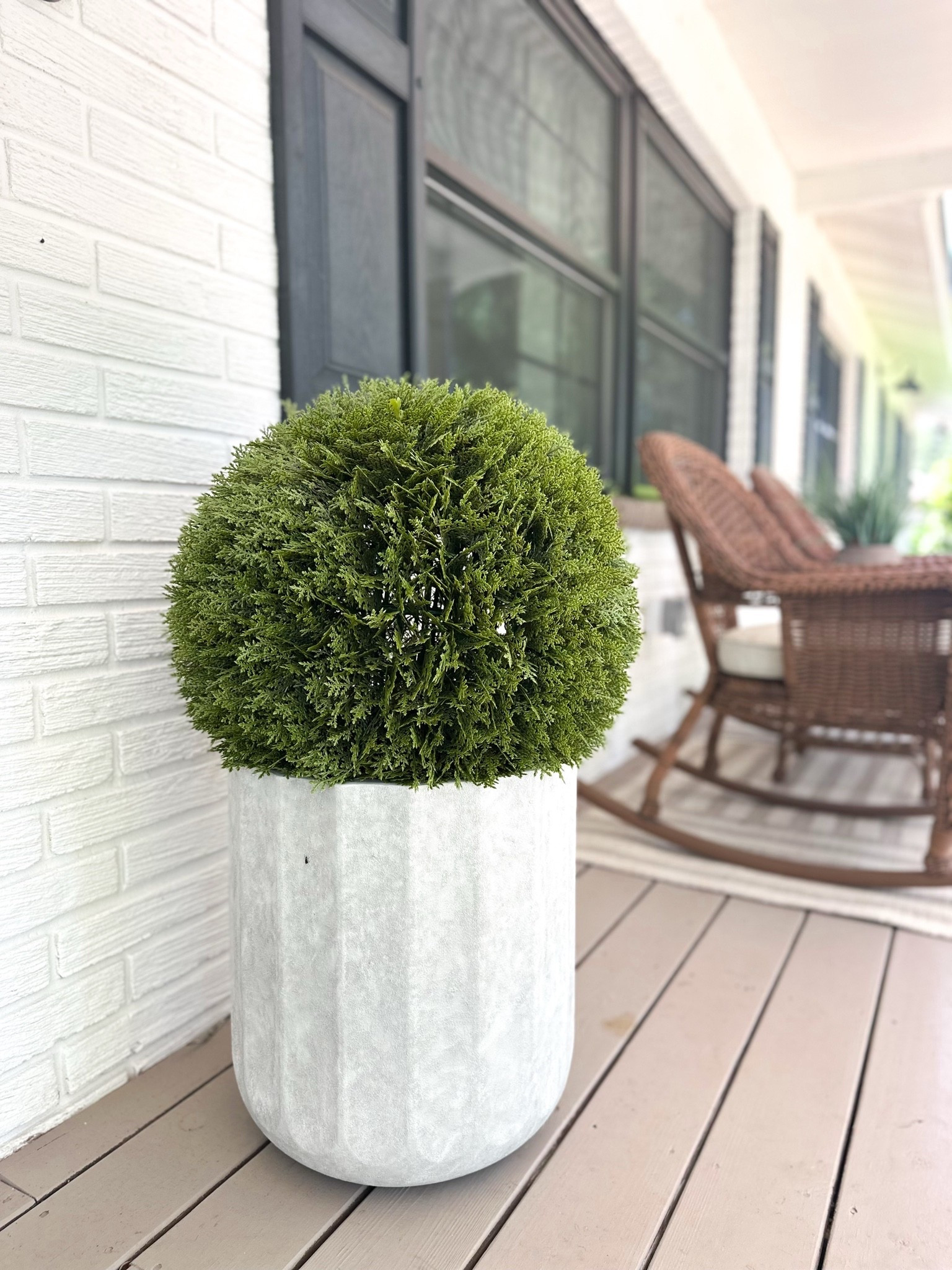 The cutest faux ceramic planter!! Also lovinggg this big green ball!