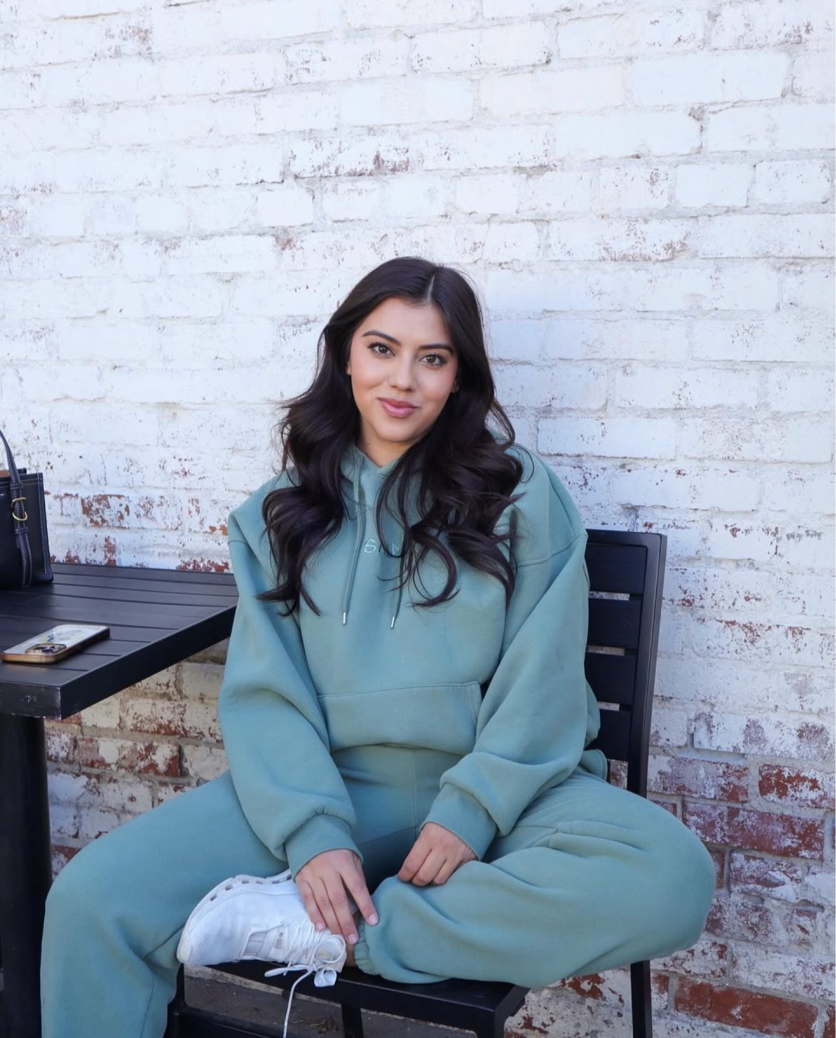 This outfit features a matching sage green oversized hoodie and sweatpants set, creating a cozy, relaxed, and effortlessly stylish look. Paired with classic white sneakers, it embodies a casual-chic aesthetic perfect for lounging or running errands. #loungewear #cozyset 

#LTKActive #LTKShoeCrush