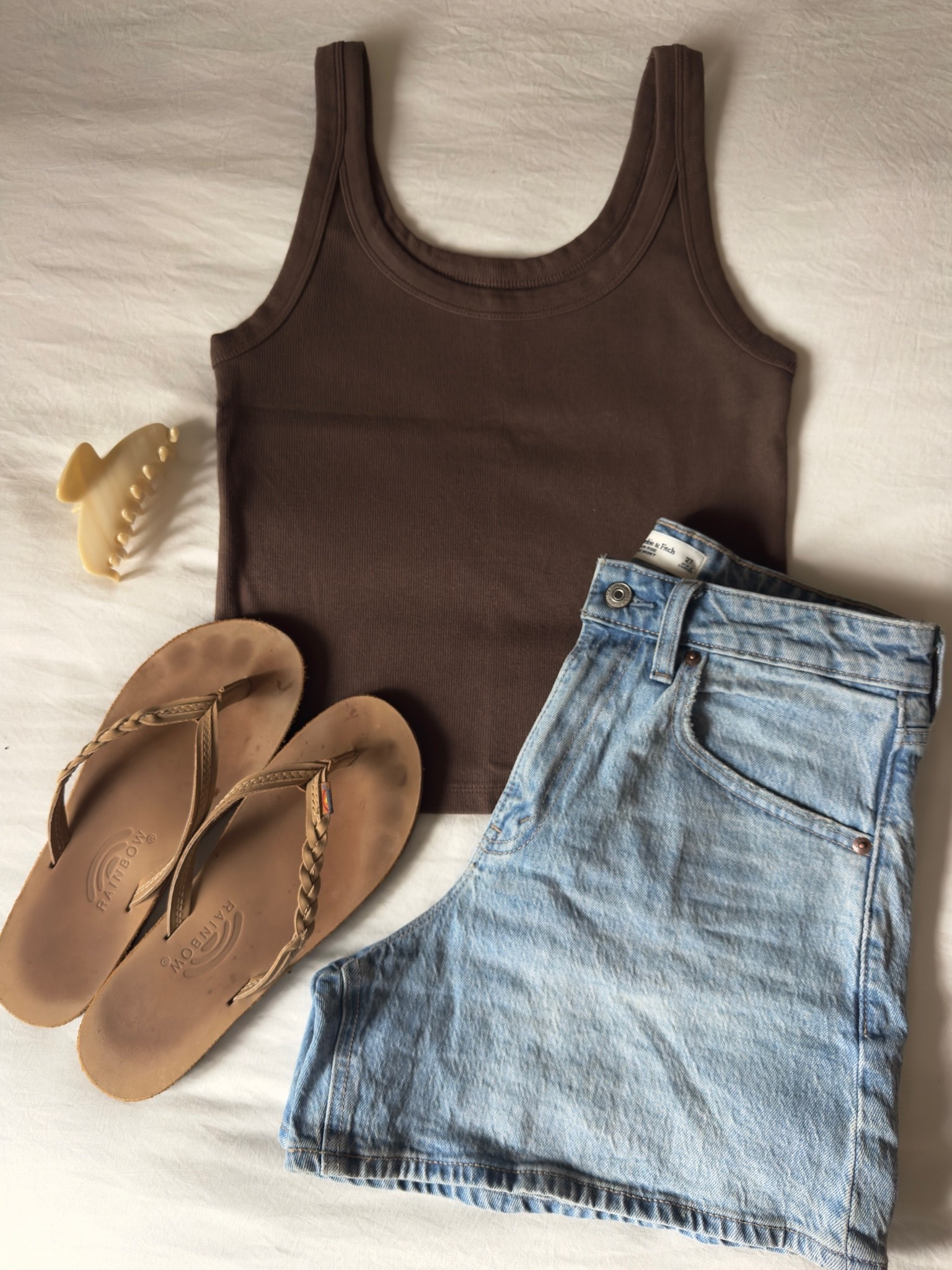 Casual summer outfit idea 🤎 

#ae #emijay #rainbowflipflops #jeanshorts #casualoutfit #outfitinspo

#LTKootd #LTKSeasonal