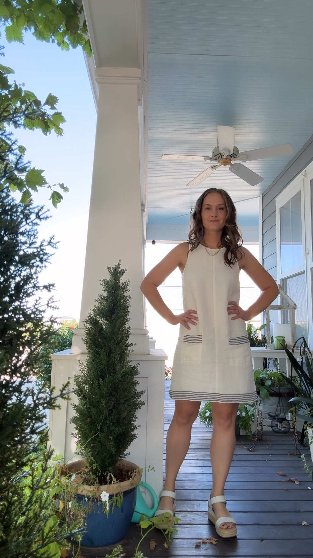 It’s a Monday in August, and the city mom is feeling effortlessly chic in a white A-line linen dress with blue stripe detailing—perfect for a day spent visiting her parents in Missouri. She pairs it with white flatform sandals that add just the right amount of height and comfort for a busy day ahead. Her go-to gold hoops and graduated rope necklace layered with her signature herringbone chain give the outfit a touch of elegance, while her new stack of permanent bracelets, combined with a diamond tennis bracelet, sparkles with understated glamour. The morning kicks off with family photos, capturing that perfect mix of joy and chaos, before she heads out with her mom for a little shopping and a girls’ lunch. Later, she helps her dad with grocery shopping before sneaking away to a cozy coffee shop to answer emails and work on her blog. It’s a day full of family, laughter, and productivity, with just the right amount of style to match her effortlessly busy life.

#LTKStyleTip #LTKWorkwear #LTKSeasonal