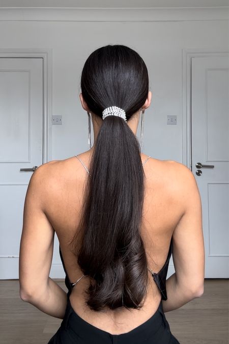 Disco party hair ~ decorate your ponytail with rhinestone. Pair with sparkling chandelier earrings. 

#LTKstyletip