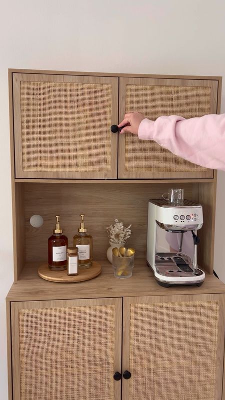 Set up my coffee bar cabinet with me ☕️ it’s back in stock after being sold out for months! 

Coffee syrup dispensers, bamboo lazy Susan, breville espresso machine, gold spoons, cabinet storage shelf, mugs, amazon furniture, gold spice jars, glass iced coffee cup, fancythingsblog 

#LTKHome #LTKStyleTip #LTKFindsUnder100