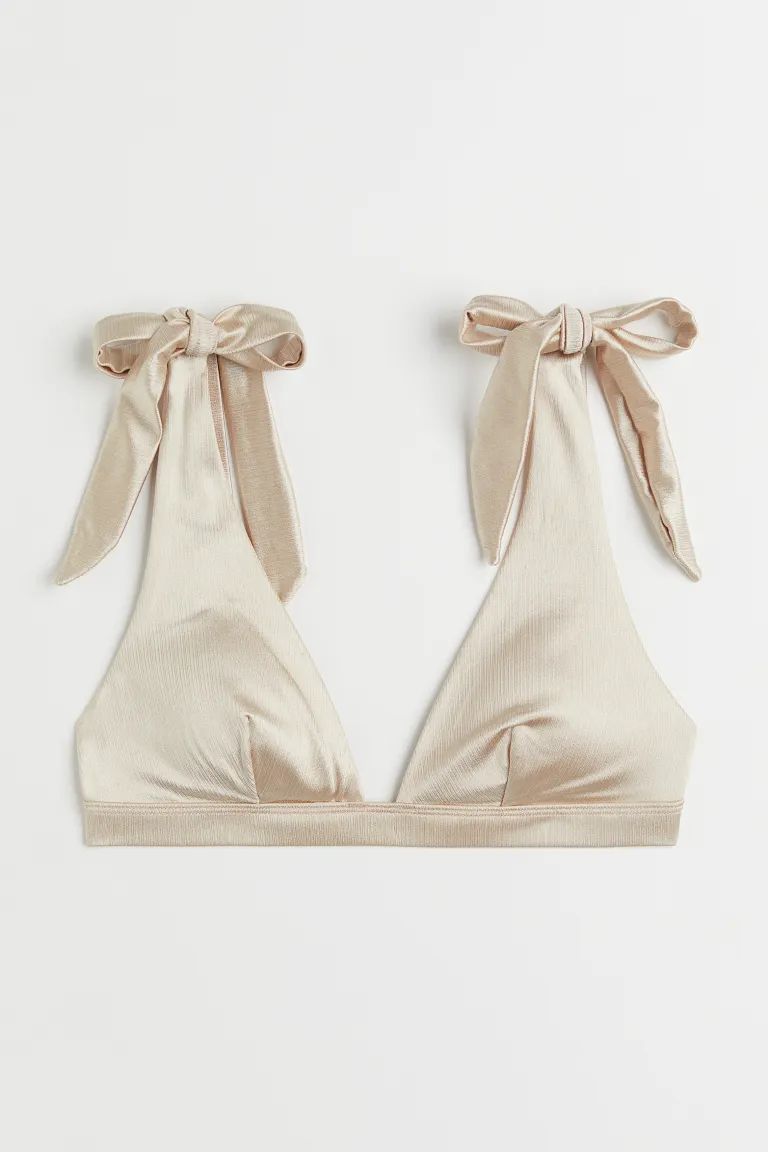 Conscious choice  Lined, soft-cup bikini top. Wide, tie-top shoulder straps, cups with removable ... | H&M (US)