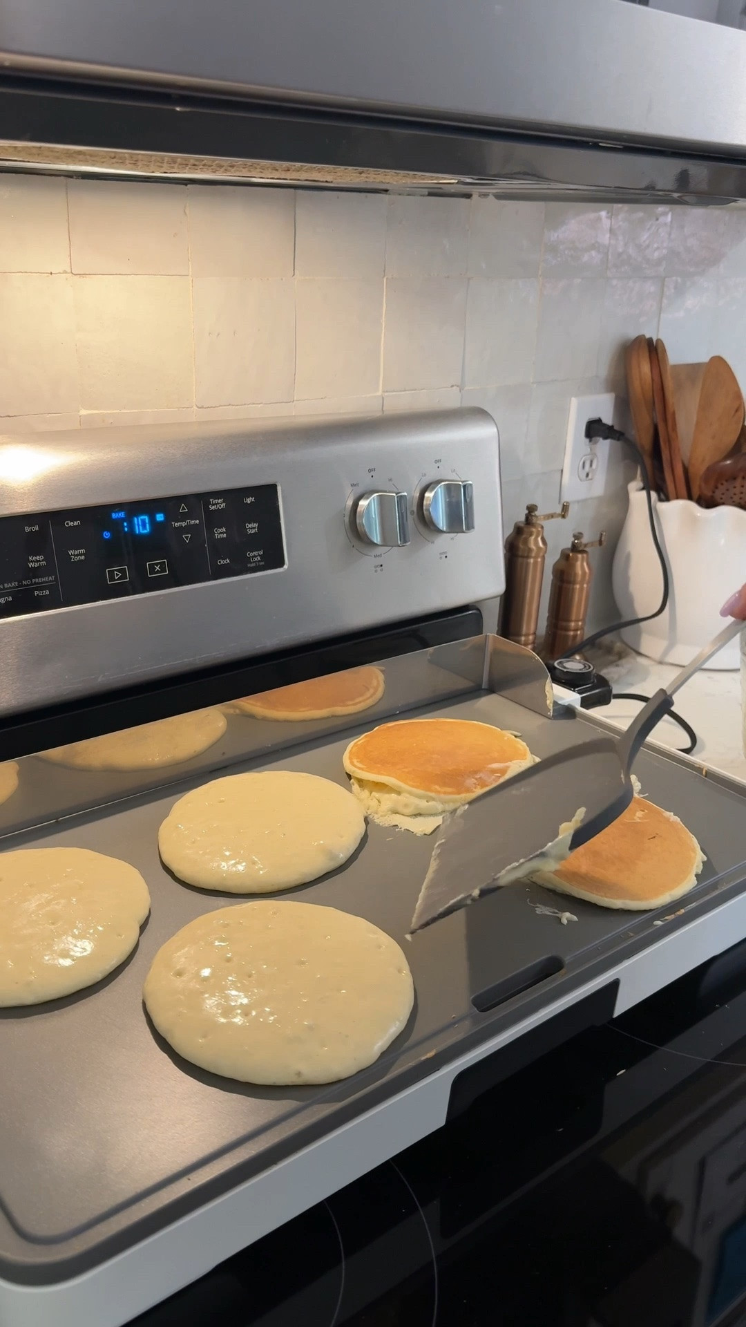 Our griddle is perfect for pancakes, sausage, and more! 
The XL surface allows you to cook lots of  items at once! 

Features: 
• XL family-sized cooking surface makes up to 15 pancakes or eggs at once to feed the entire family
• Durable, long-lasting material with soft matte premium finish
• Slim design for easy cabinet storage
• Detachable stainless steel backsplash to keep your counter clean while cooking
• Removable drip tray collects unwanted fats and oils from food
• Removable heat control with easy-to-use dial ranging from 200°F-400°F
• Cool-touch handles for convenient handling

#LTKmomlife #LTKdayinmylife #LTKHome