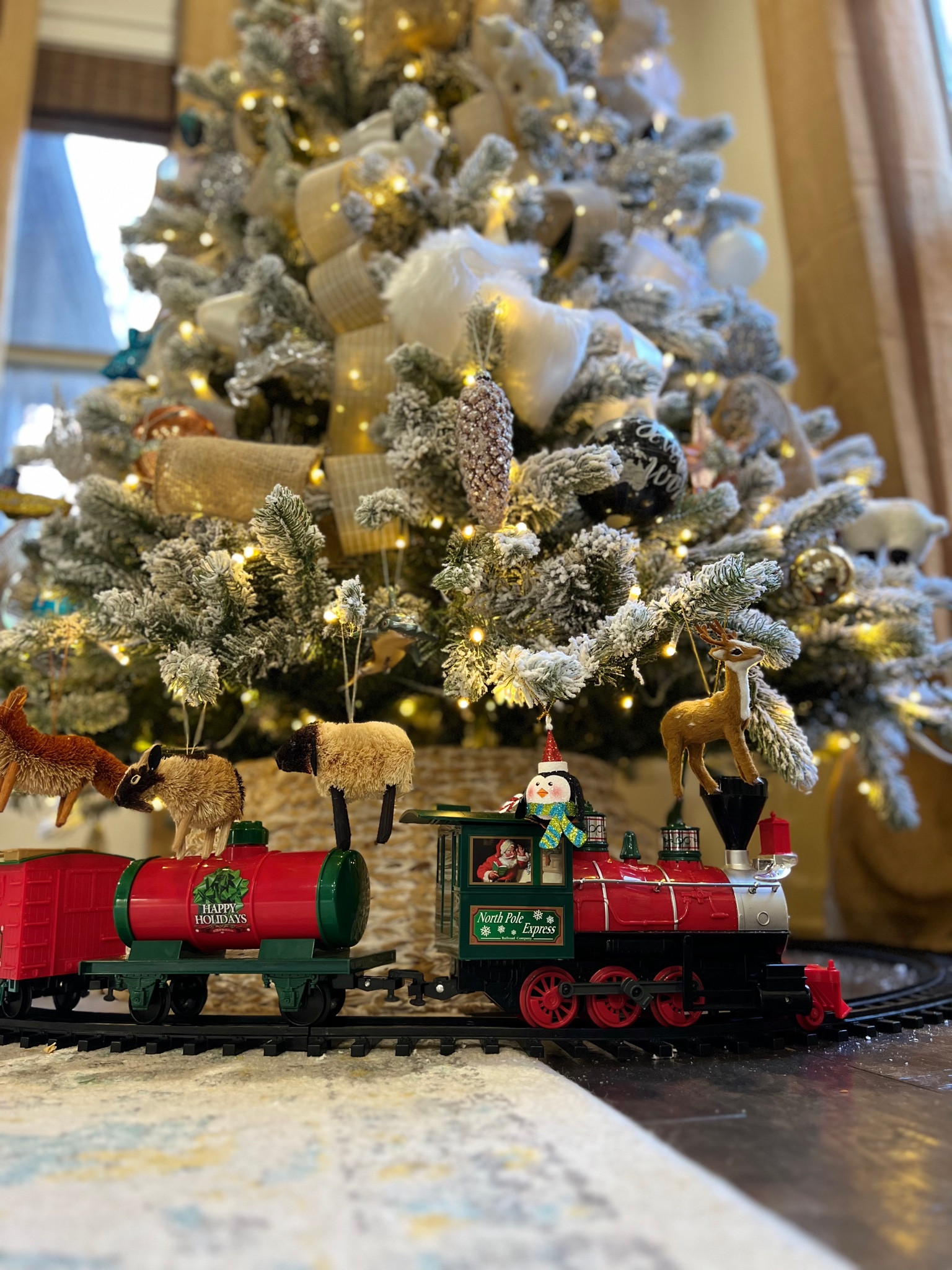 Christmas Decor // Train Set around the Christmas Tree // Kings of Christmas // gold Christmas decor // ornaments  

#LTKSeasonal #LTKHoliday #LTKhome