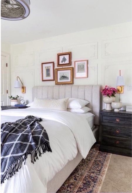 Our neutral, vintage inspired guest bedroom styled with a tufted headboard, vintage art, black nightstands, white bedding, gold wall sconces and cozy blankets and pillows! 

home decor ideas, simple home decor, guest bedroom decor, vintage decor, neutral decor, vintage style, guest bedroom inspo

#LTKhome