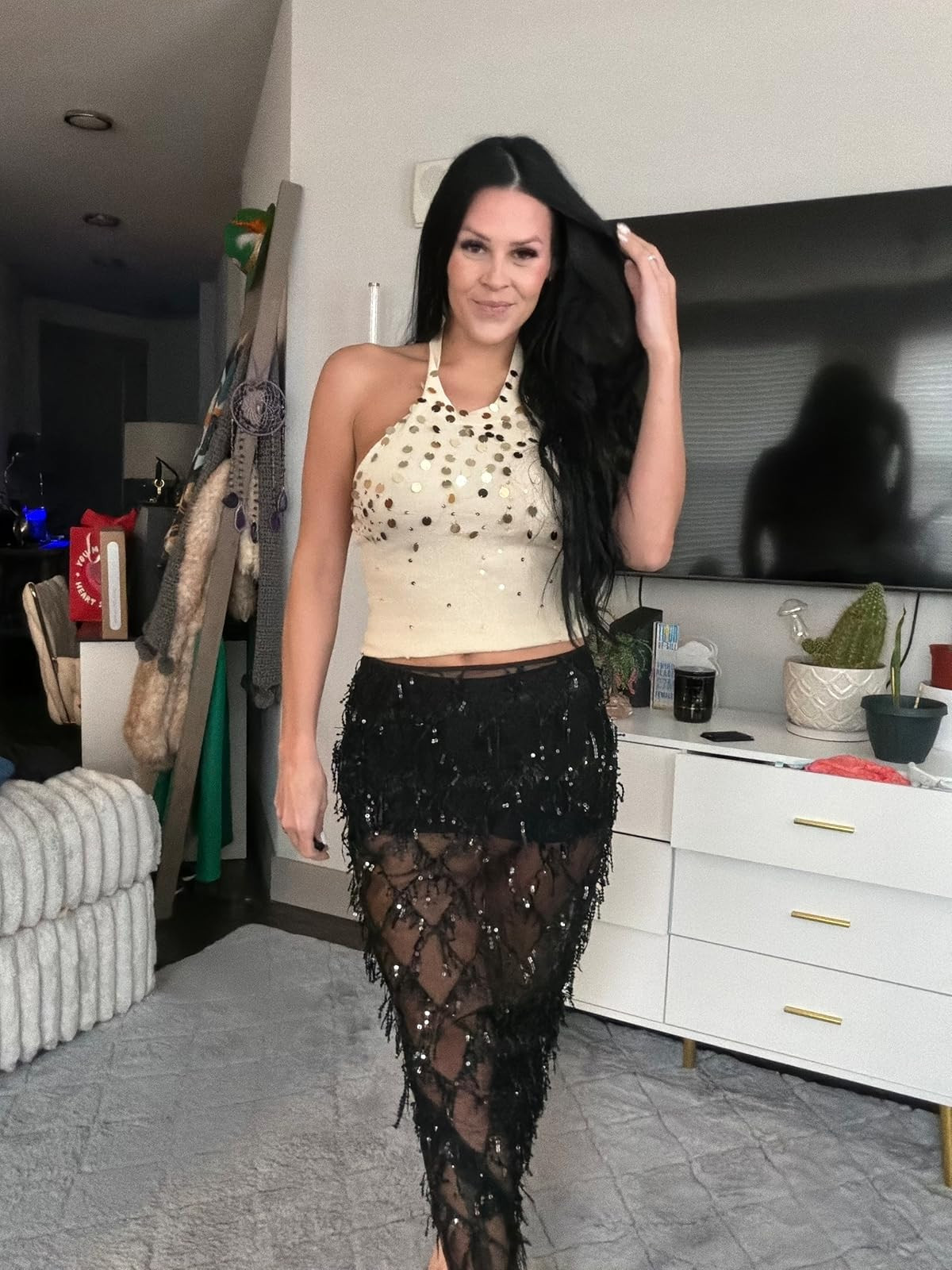 Tropical getaway. This striking set features a vibrant blue hibiscus print on a black mesh crop top and matching high-waisted swim shorts. #TropicalPrint #VacationStyle #LTKswim 

 #LTKSpringSale #LTKdayinmylife #LTKootd