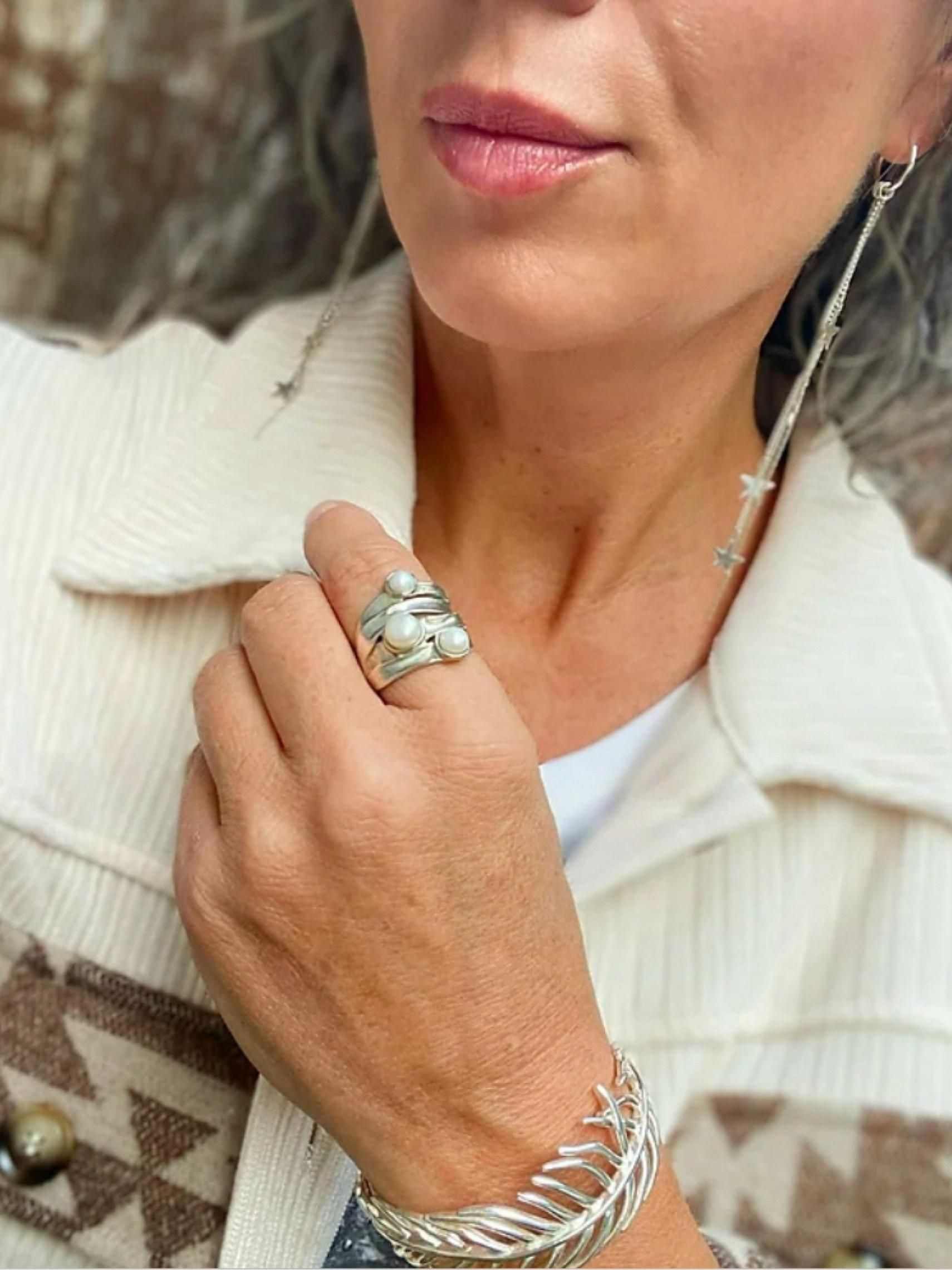 Organic-inspired silver are a cool, unexpected touch.

#LTKover40 #LTKstyletip
