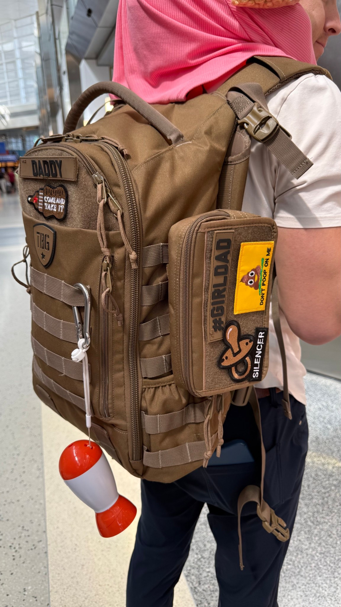 Adam in full dad mode when traveling 😆! He loves his Tactical Baby Gear! 👏🏻

#LTKBaby #LTKTravel #LTKFamily