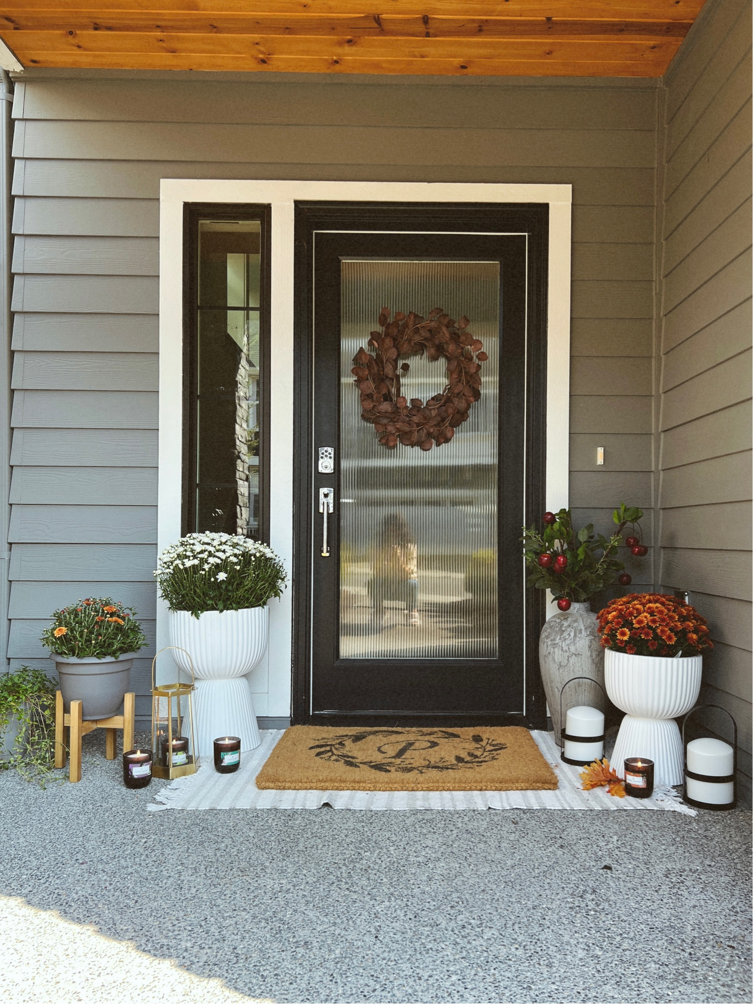 (CANDLE CODE: APRIL for 15% OFF) / Fall front porch decor / fall candles on sale / initial front door mat / fringe front door mat / southern elegance candle co / stacked planter / mums on sale / faux apple blossom stems / fall wreaths on sale / spa candles / gift ideas / outdoor lanterns / home decor inspo / modern farmhouse style / fall ootd / #secandleco #relaxing #newrelease #fall 

#LTKhome #LTKSeasonal #LTKHalloween