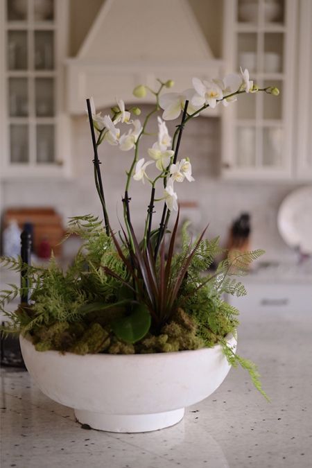 Centerpiece inspiration-can use a faux or real orchid!

#centerpiece 
#homeinspo
#classydecor

#LTKFamily #LTKHome