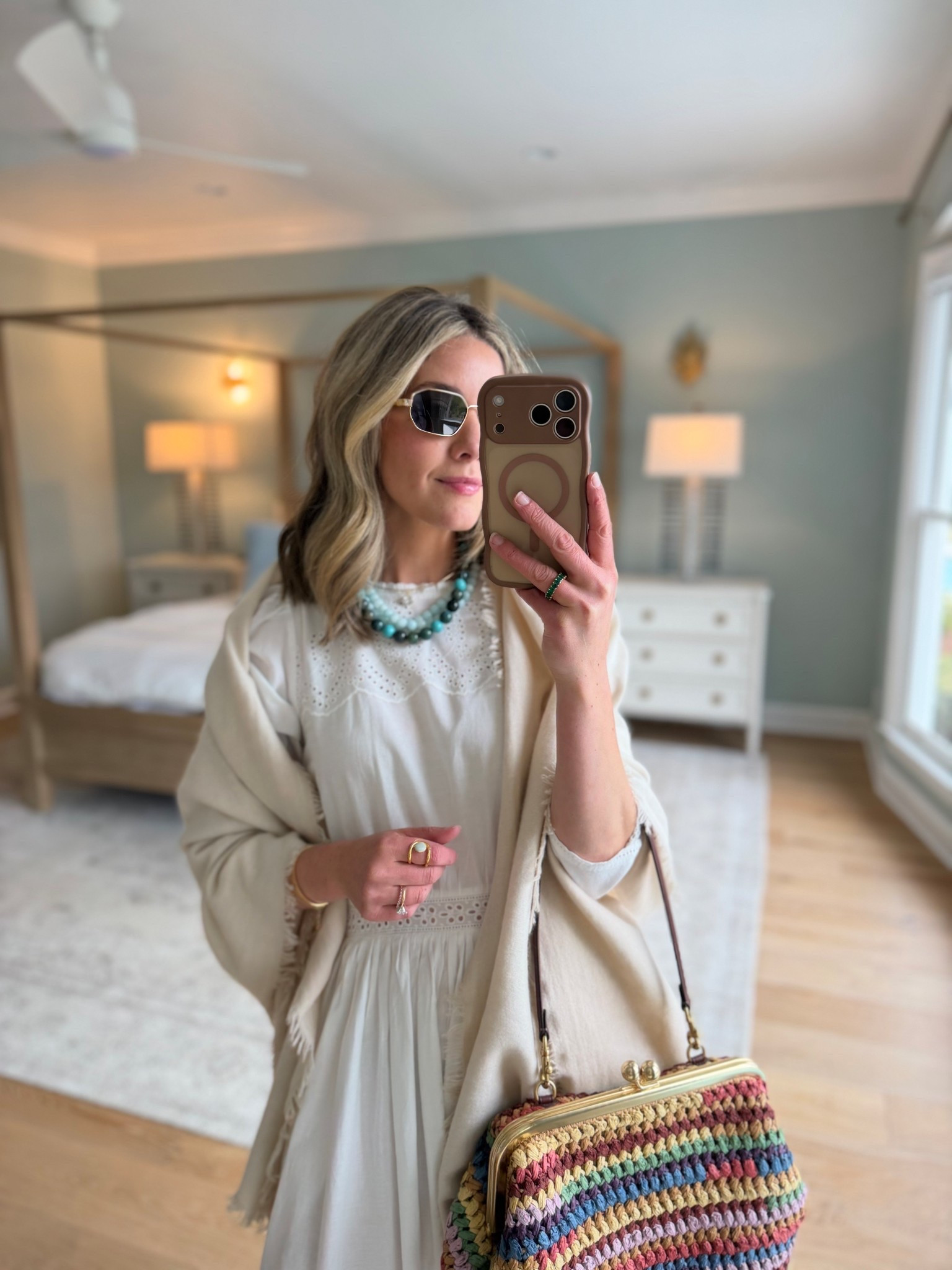 same easy travel look, but the accessories really made it feel like an outfit 💫 kept the base simple with a white dress and neutrals, then added a little interest with the woven flats, a soft layer, and this colorful bag + necklace combo. just enough to make it feel styled without overthinking it.

#LTKSeasonal #LTKootd