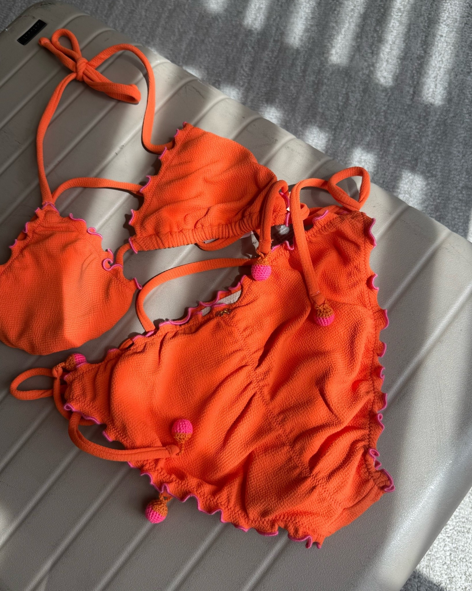 A perfect t little pop of pink on this orange bikini. 🧡🩷🧡🩷

#LTKActive #LTKSwim #LTKTravel