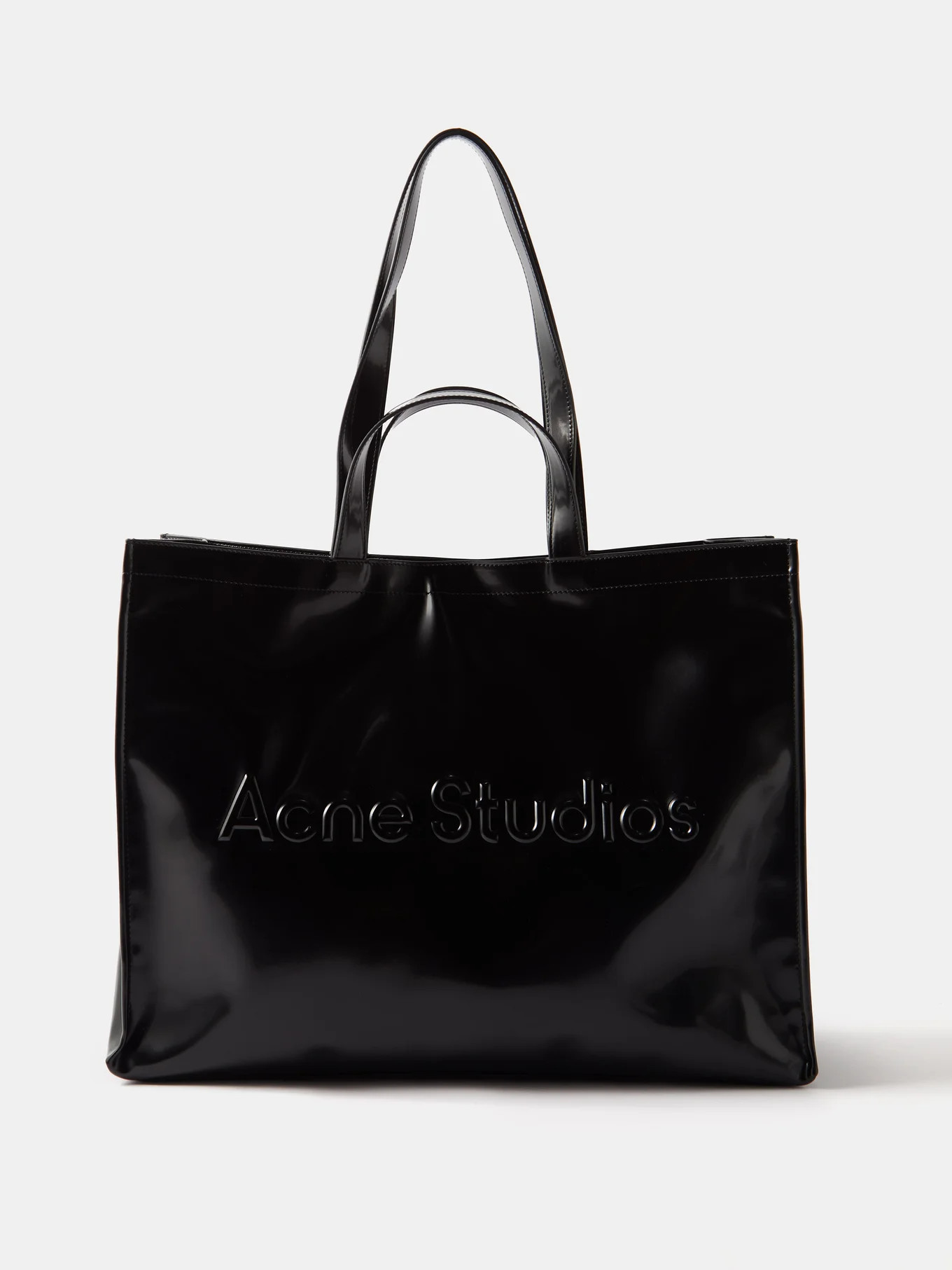 Logo-embossed rubber tote bag | Acne Studios | Matches (US)