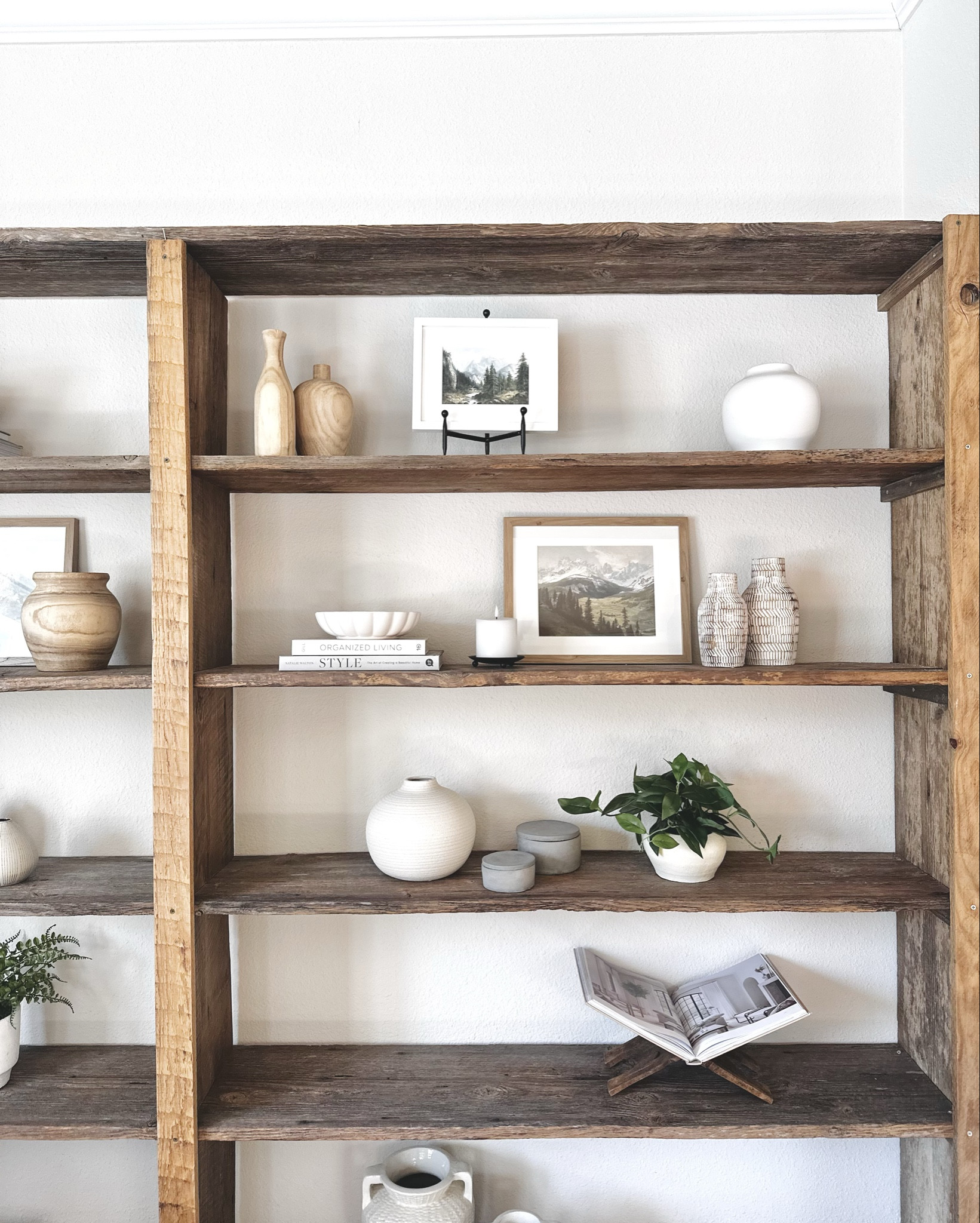 Shelf styling inspiration. Checkout my favorite finds!

Tips & tricks:
+ Stack a few design books and add a bowl to the top for height. This takes up empty wall space.
+ Vases in sets of two or three. 
+ Prints with personal art in them. Something you love or that goes with the vibe of your home. Mountain, coastal or river prints are lovely to display.
+ Faux plants that look real for that added color and earthiness.
+ Battery candles for some cozy. They flicker slightly too!
+ Easels to display are or book stands to display your favorite page in a book.

Pro tip:
Every shelf should be different and not match. You can work on all shelves at the same time. Add something to each shelf and step back each time to look for balance and filled wall space. 

I am still looking for a few items to finish my shelves but this is a start! It can take weeks sometimes a month to get them just right. Arrange when in the creative mood.

Home decor, shelf decor, shelf styling, shelving unit, decor sale, home design, pottery barn dupes, cozy home inspiration 

#LTKSaleAlert #LTKHome