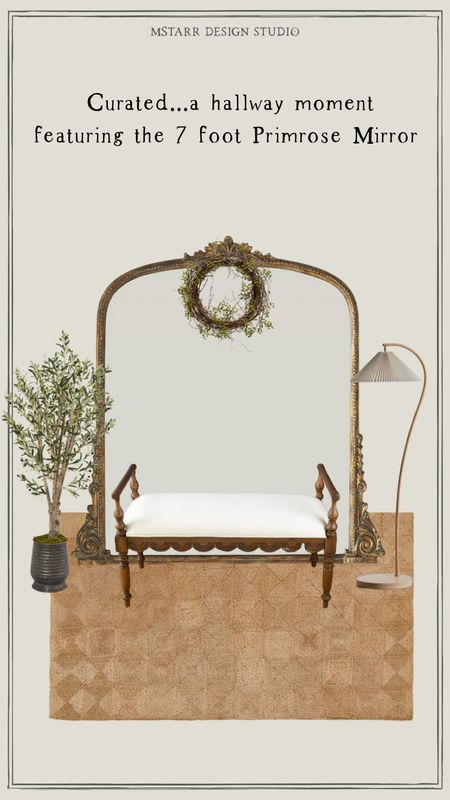 A curated hallway bench moment, featuring the 7 foot tall Primrose Mirror that is on sale now, with a scalloped bench, arched and pleated floor lamp, artificial tree in ribbed pot and jute rug. Topped off with the classiest holiday decor of a simple wreath hanging from the mirror  

#LTKHoliday #LTKsalealert #LTKhome